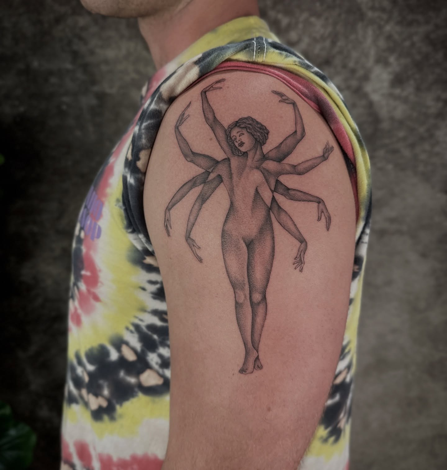 Multi-armed woman black and grey tattoo on the shoulder by Carmen Figueroa, New York, New York