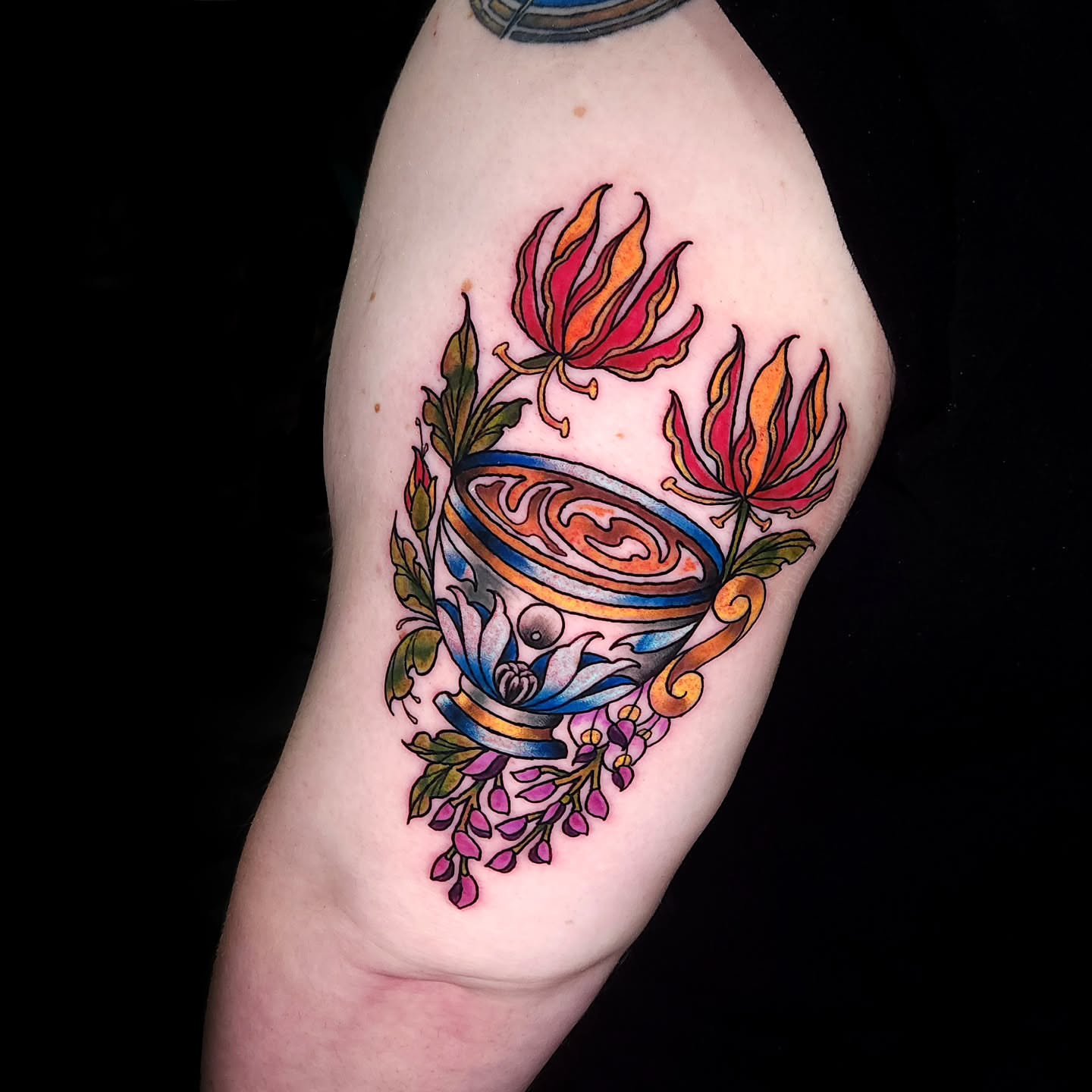 Tea cup and flowers new school tattoo on the forearm by Sheena Yu-Hsin Wood