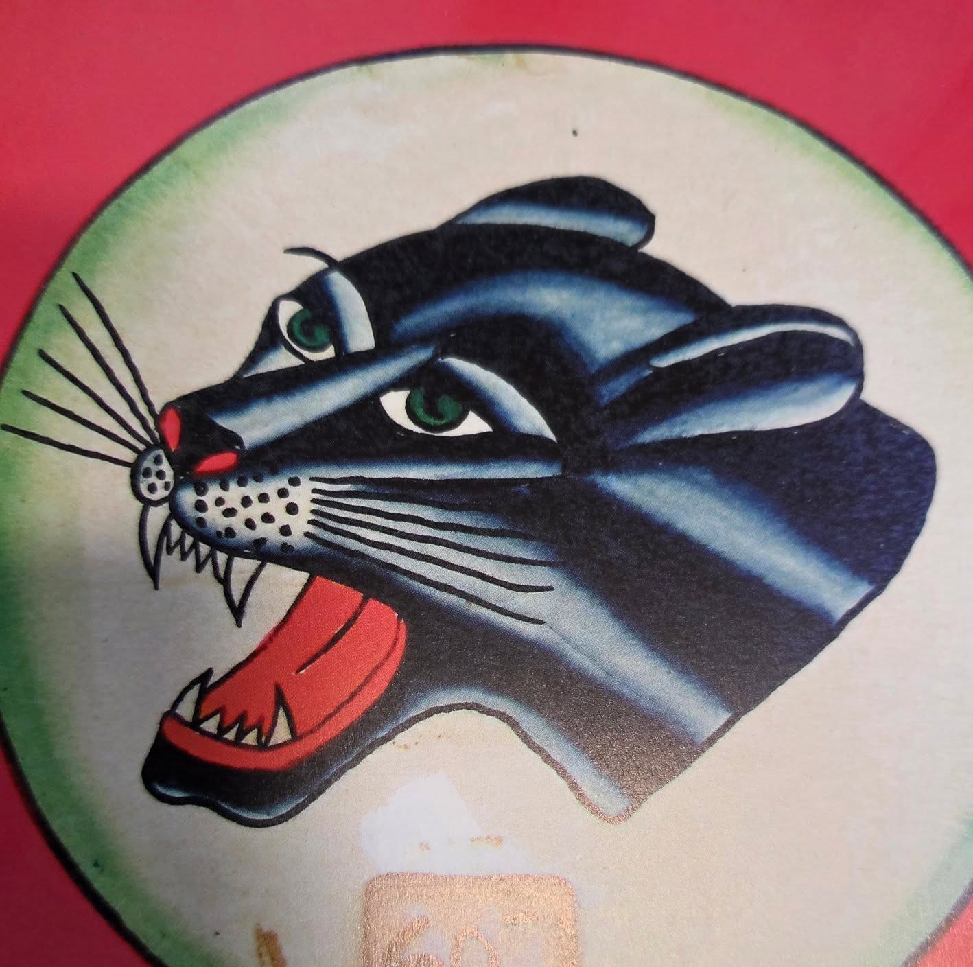 Black panther American traditional tattoo by Mitch Braver