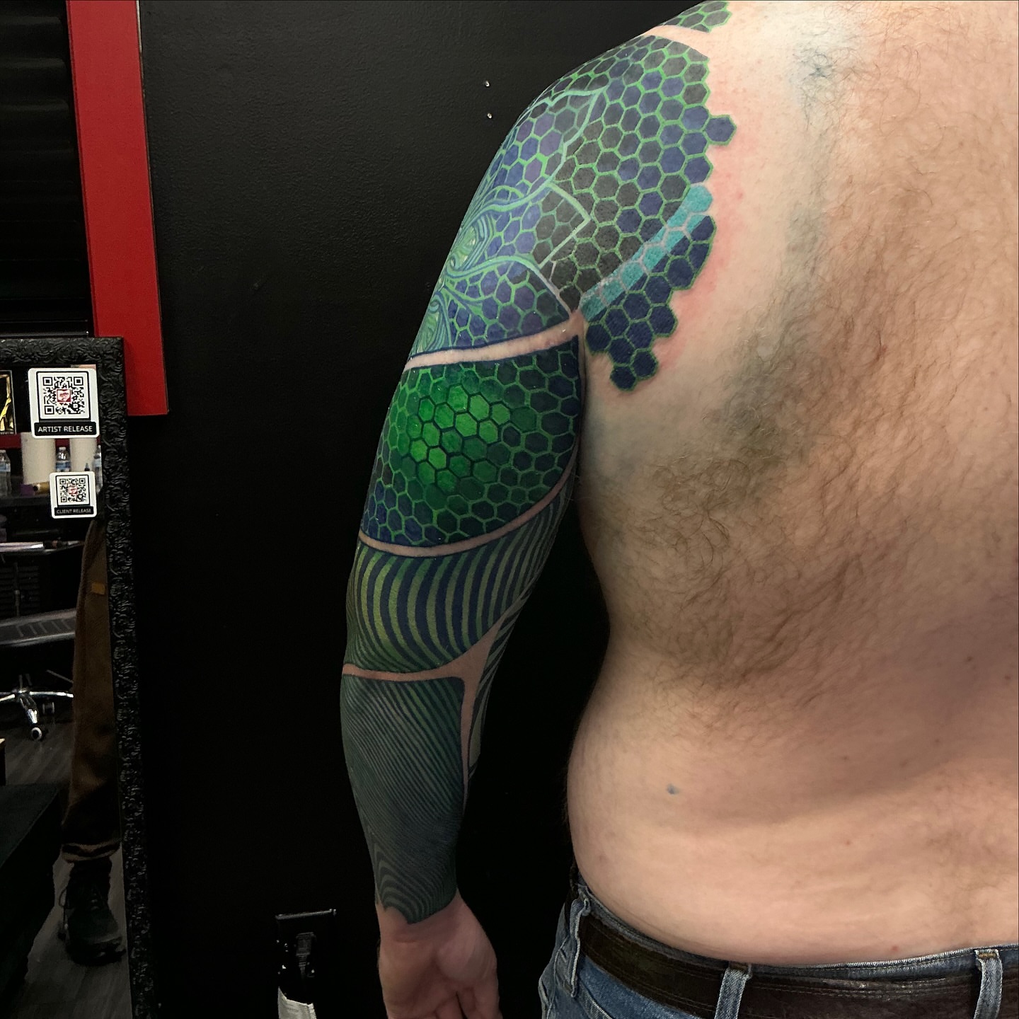 Geometric pattern geometric tattoo on the shoulder by Jordan Rookus