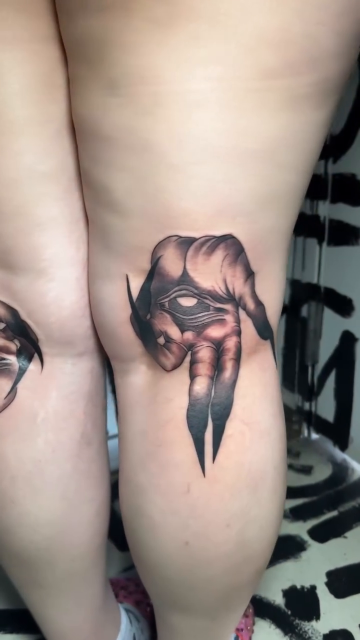 Creepy hand with eye dark realism tattoo by Brittney