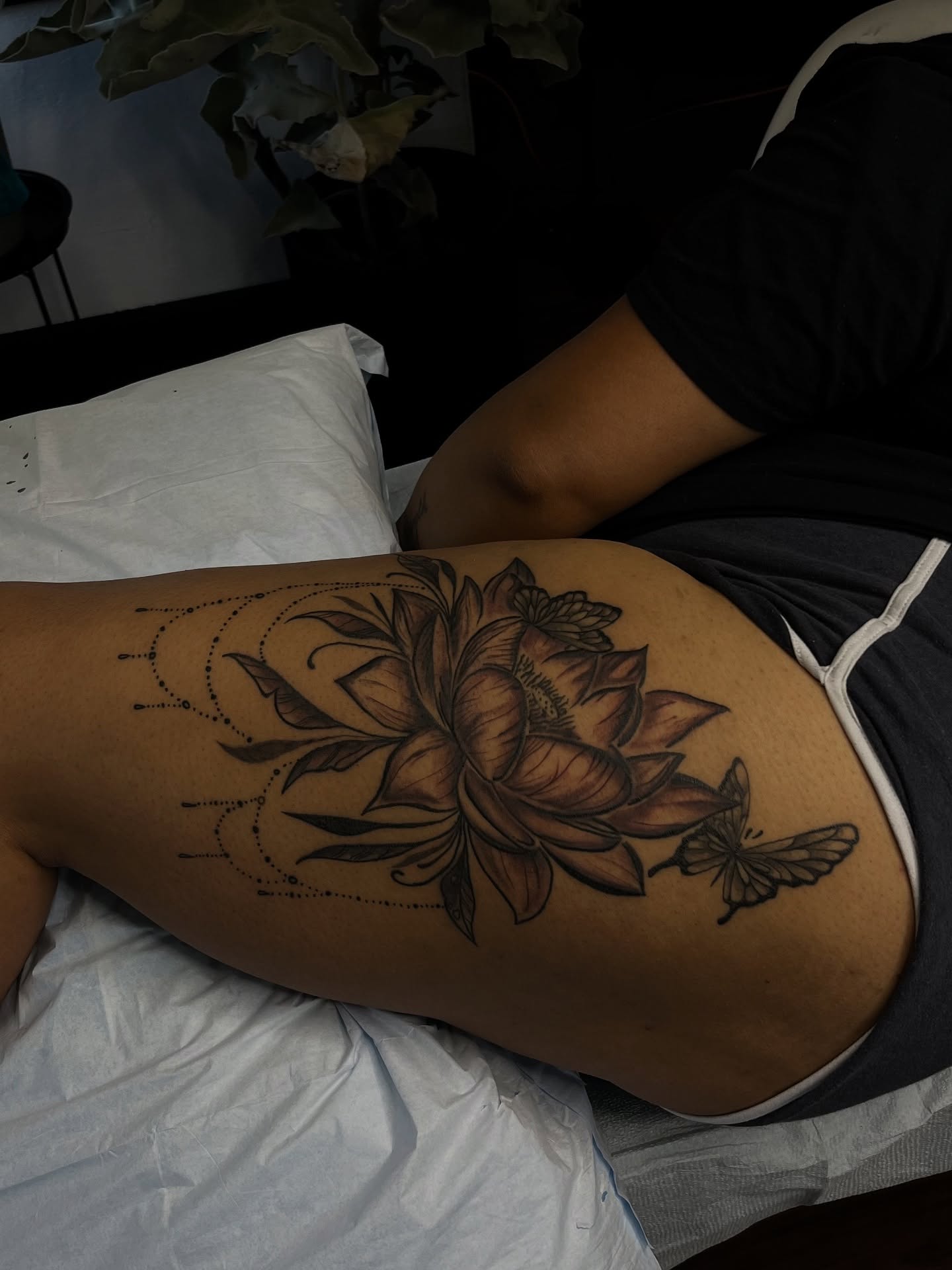 Lotus flower dotwork tattoo on the thigh by Unknwn Ink ⭐️