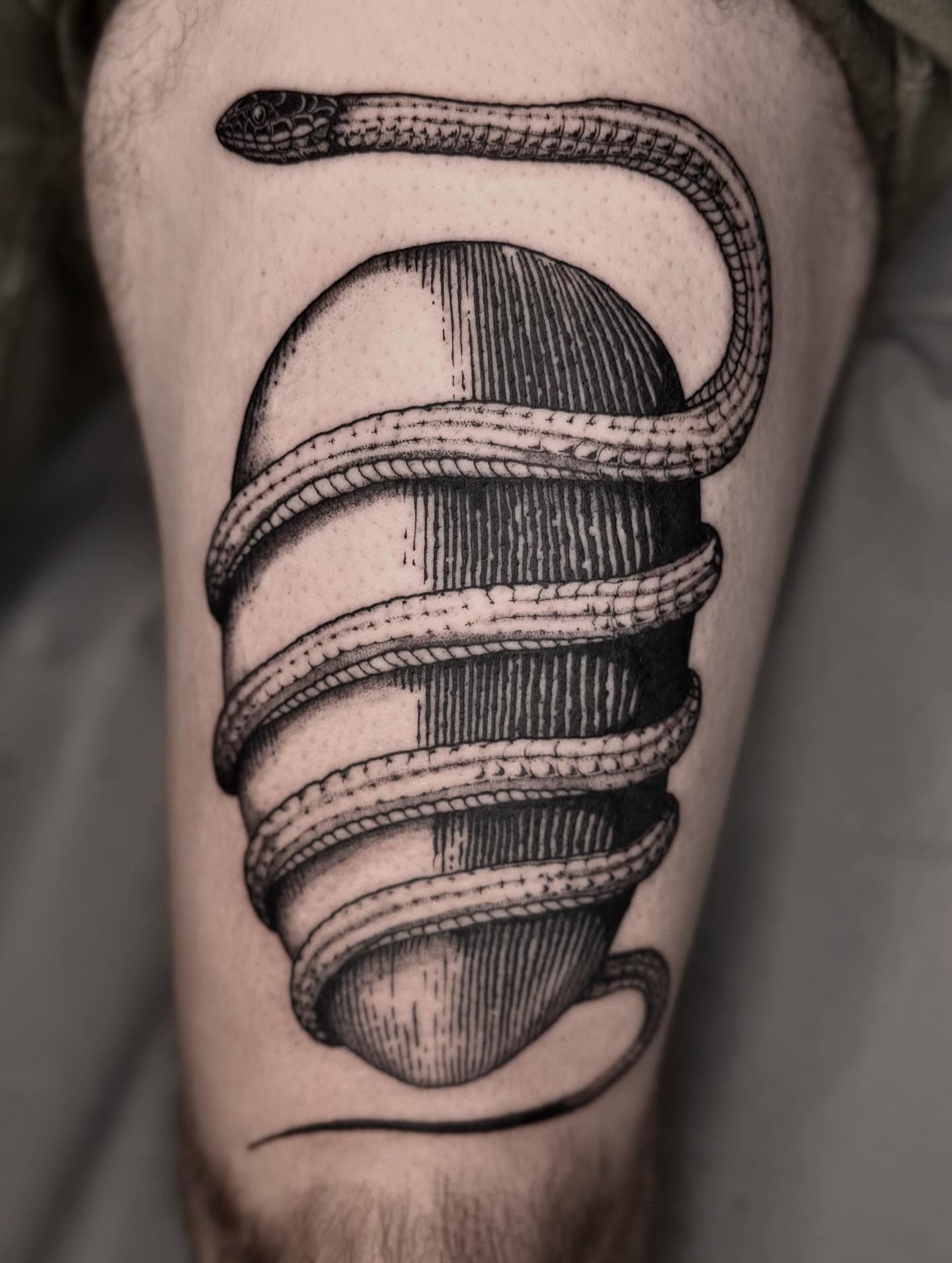 Snake and sphere geometric tattoo on the forearm by 𝐋𝐢𝐬𝐚 𝐊𝐨𝐫𝐳𝐞𝐧𝐨𝐰𝐬𝐤𝐢