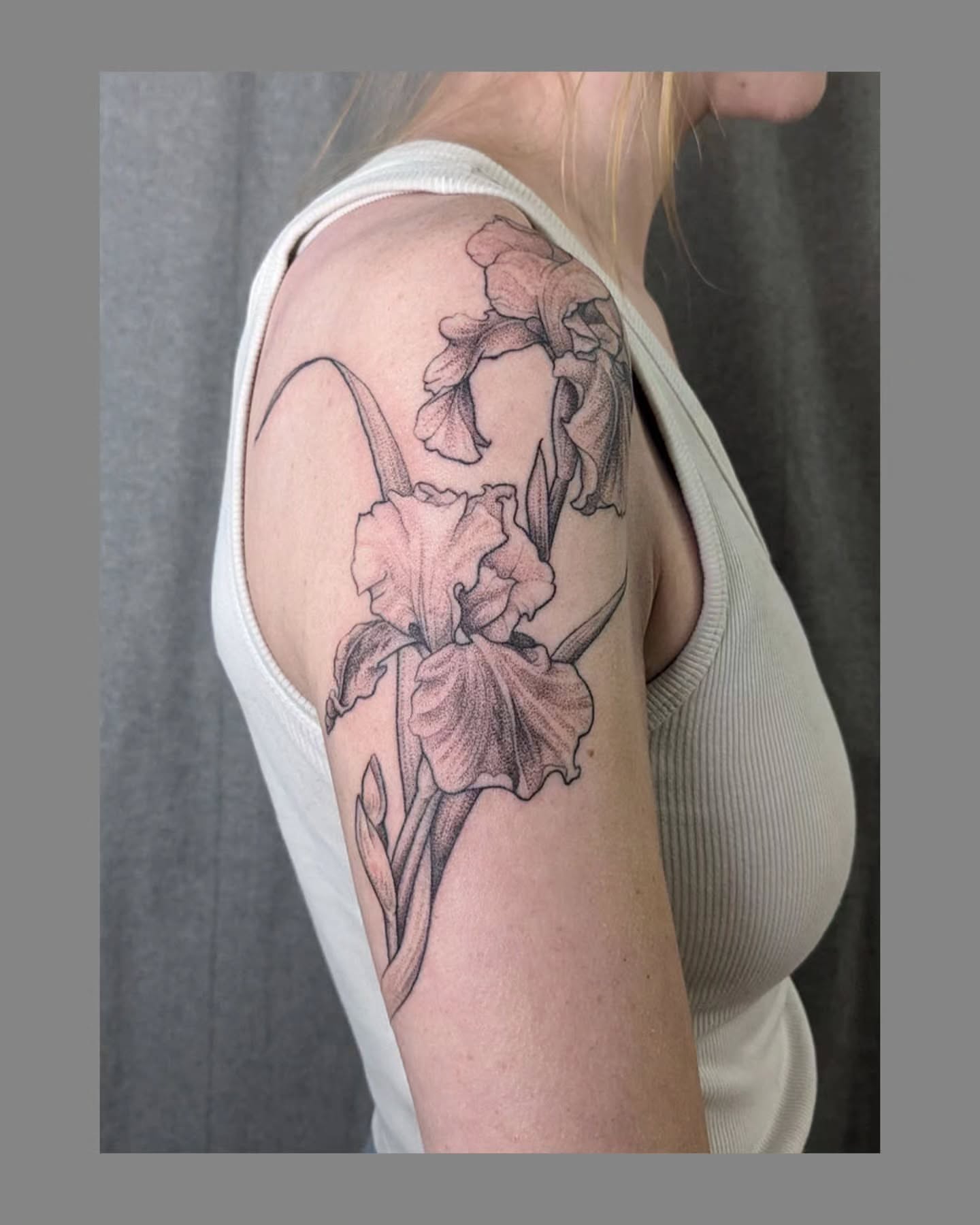 Iris flowers dotwork tattoo on the shoulder by Marria