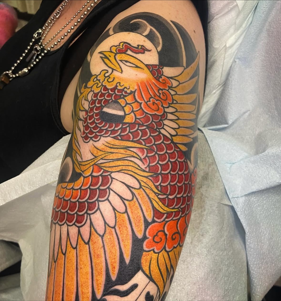 Phoenix American traditional tattoo on the upper arm by Las Vegas Tattoo Artist π€ Nani