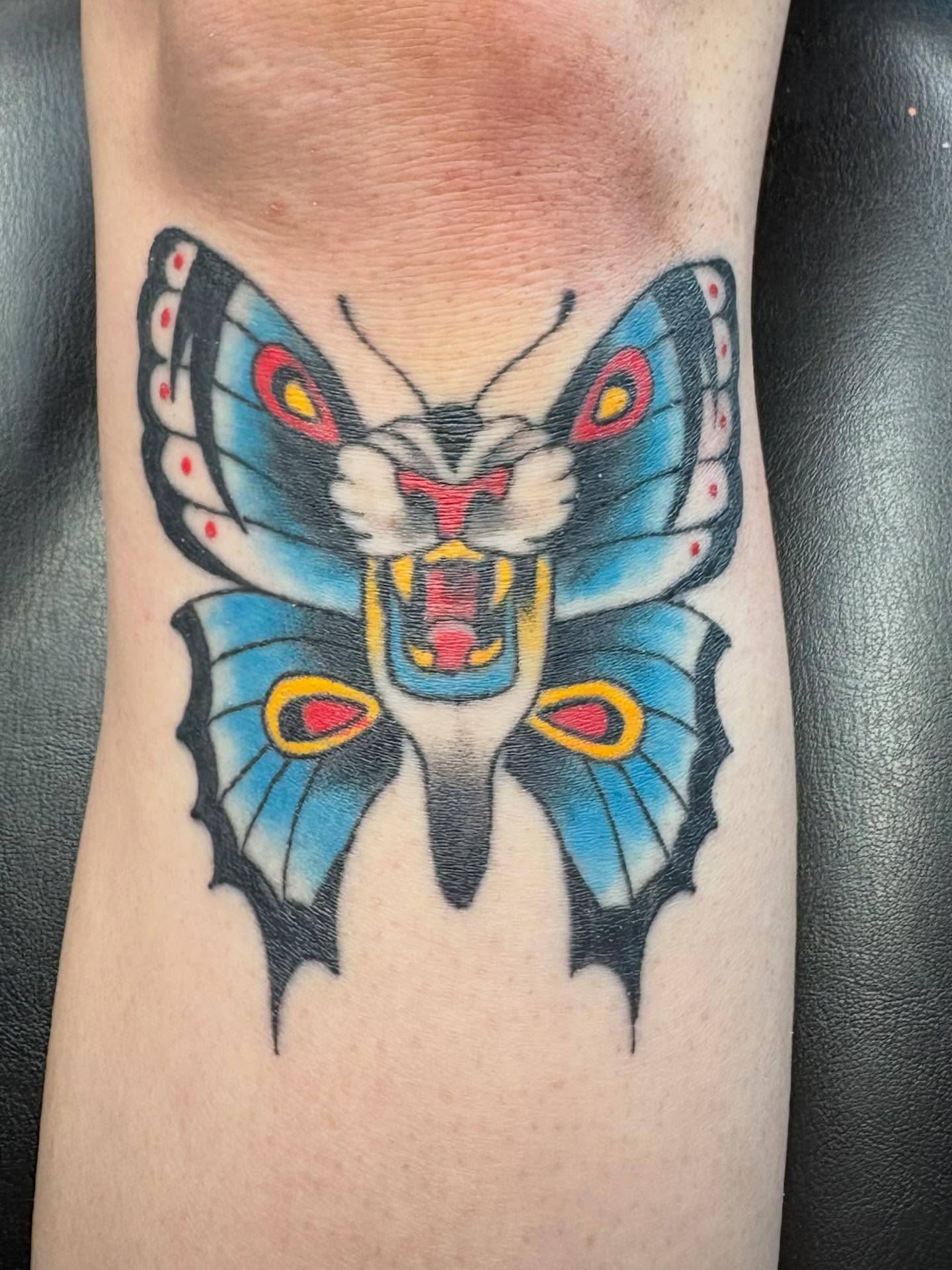 Butterfly American traditional tattoo on the forearm by Robbie Reel, Wichita, Kansas