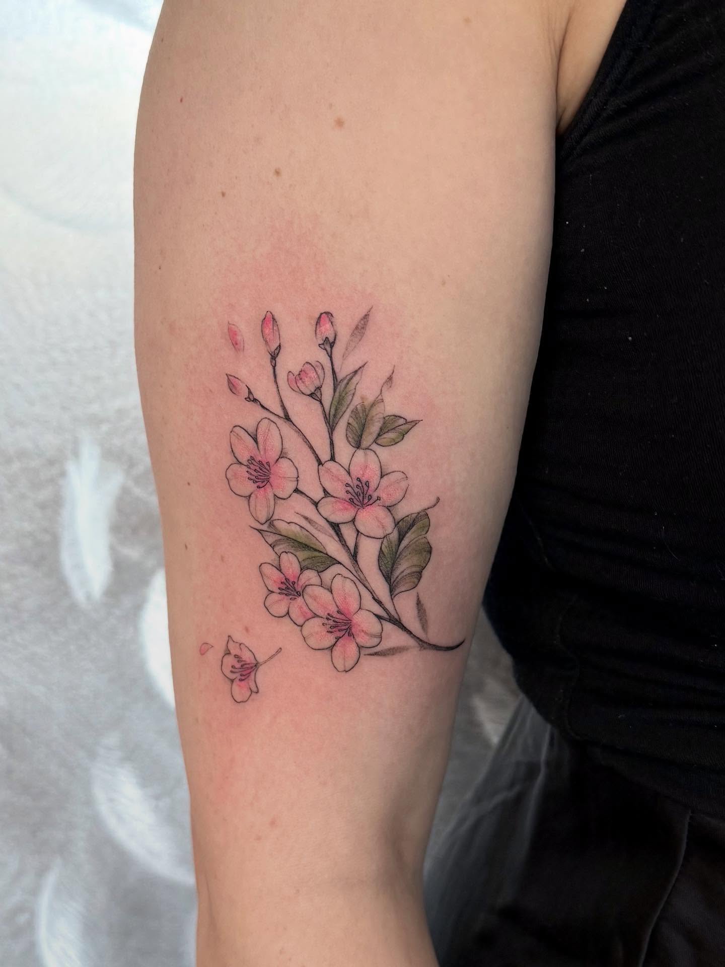 Cherry blossoms dotwork tattoo on the forearm by Marianna D D King