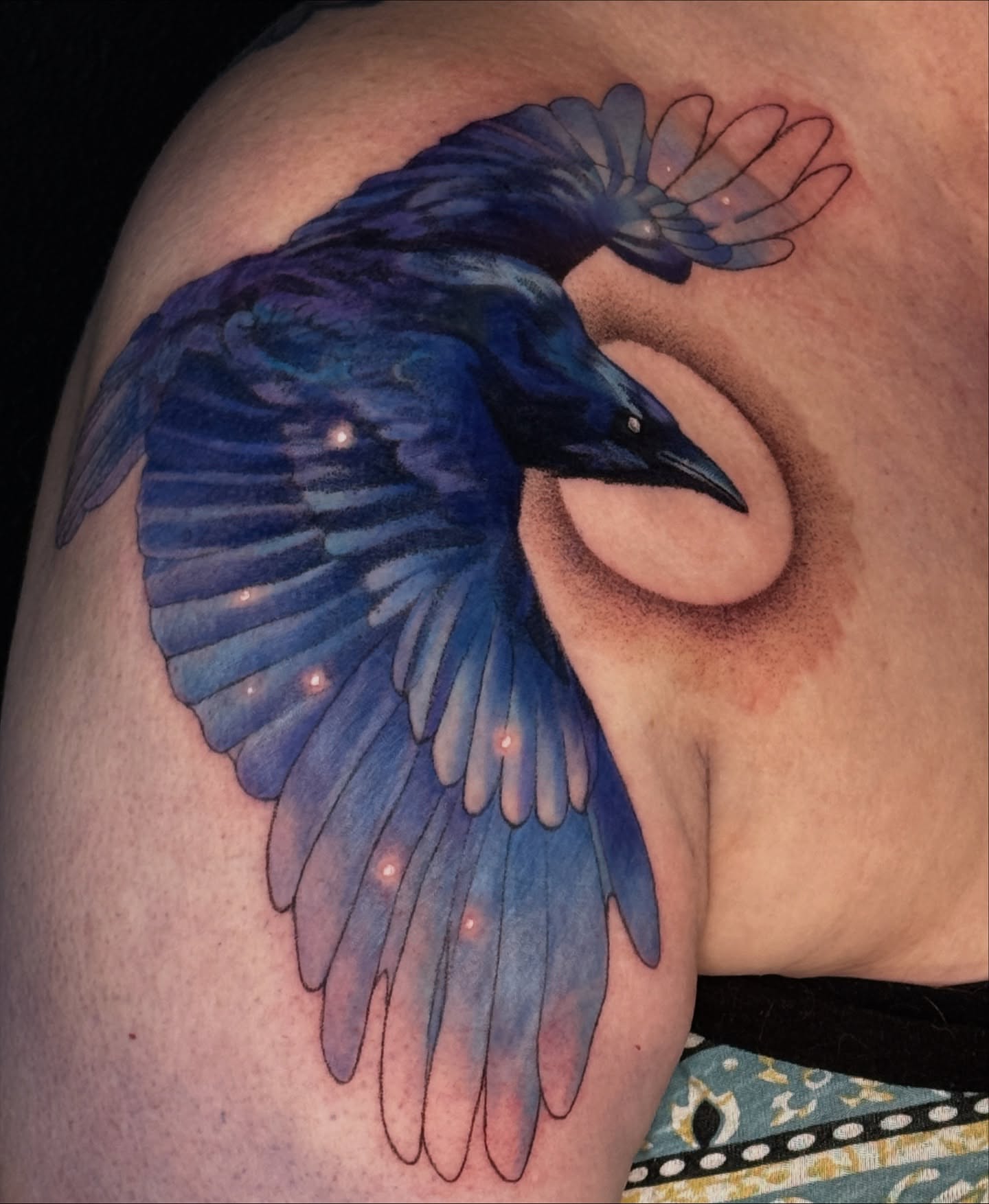 Crow realism tattoo on the shoulder by Jordan