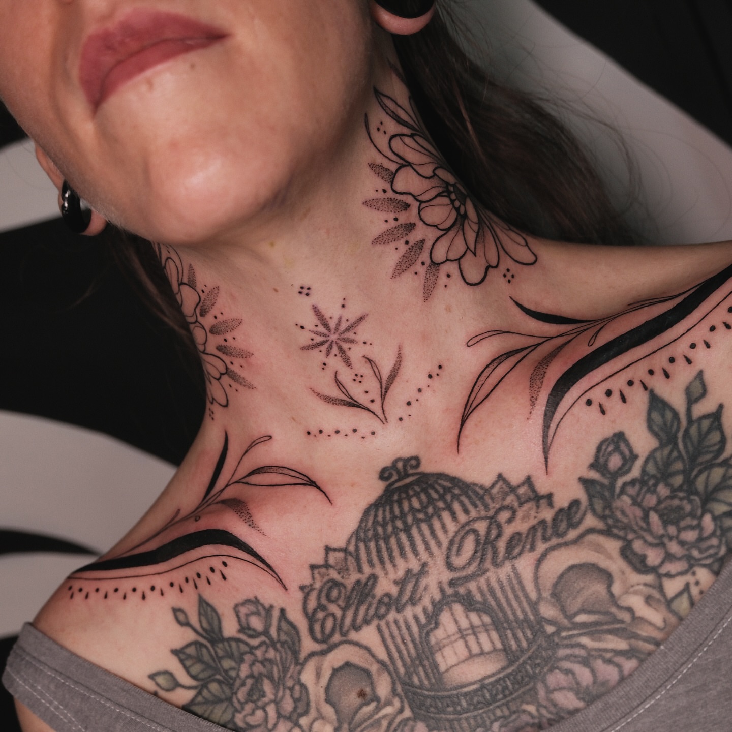 Floral and script dotwork tattoo on the neck by Velvet, Seattle, Washington