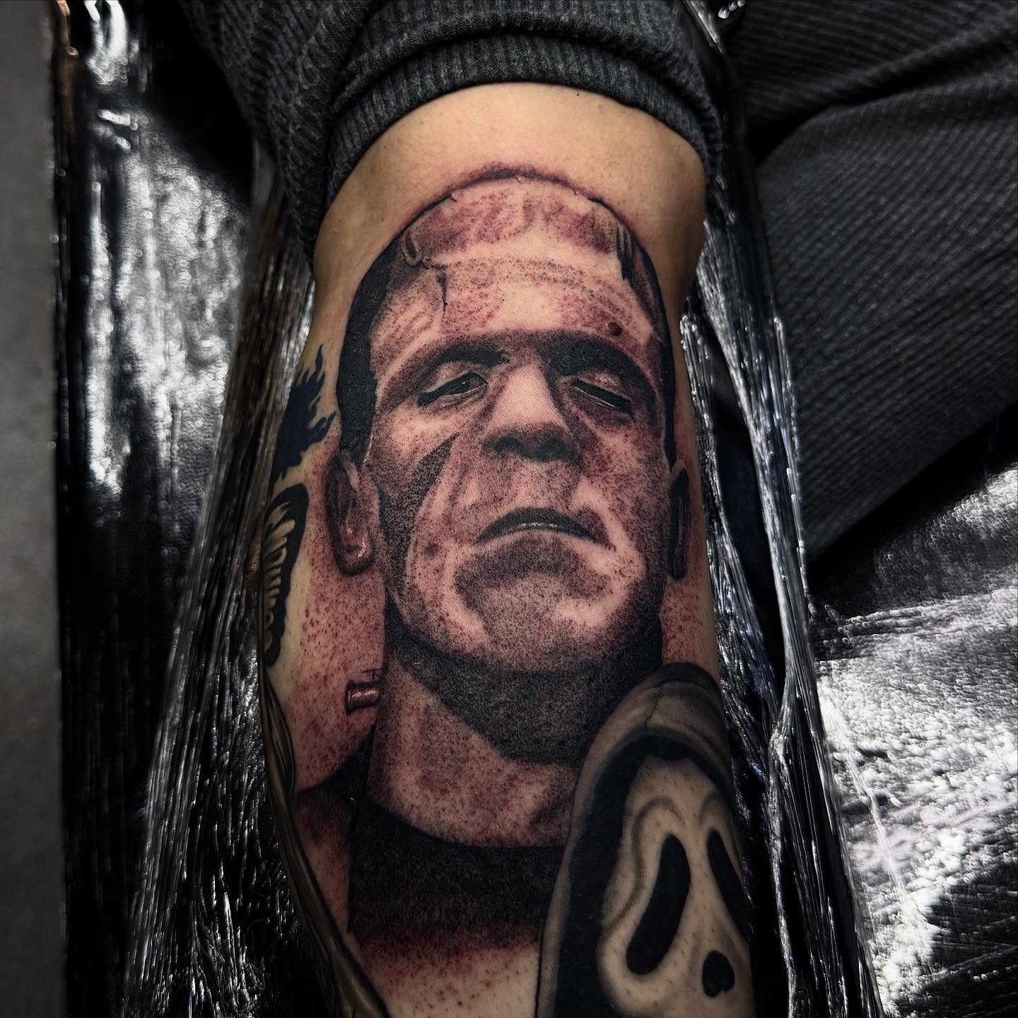 Frankenstein realism tattoo on the forearm by Joey Moreno