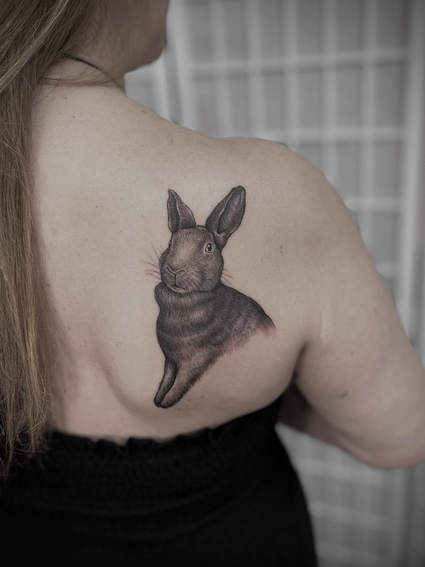 Rabbit realism tattoo on the shoulder by Tattoo Artist