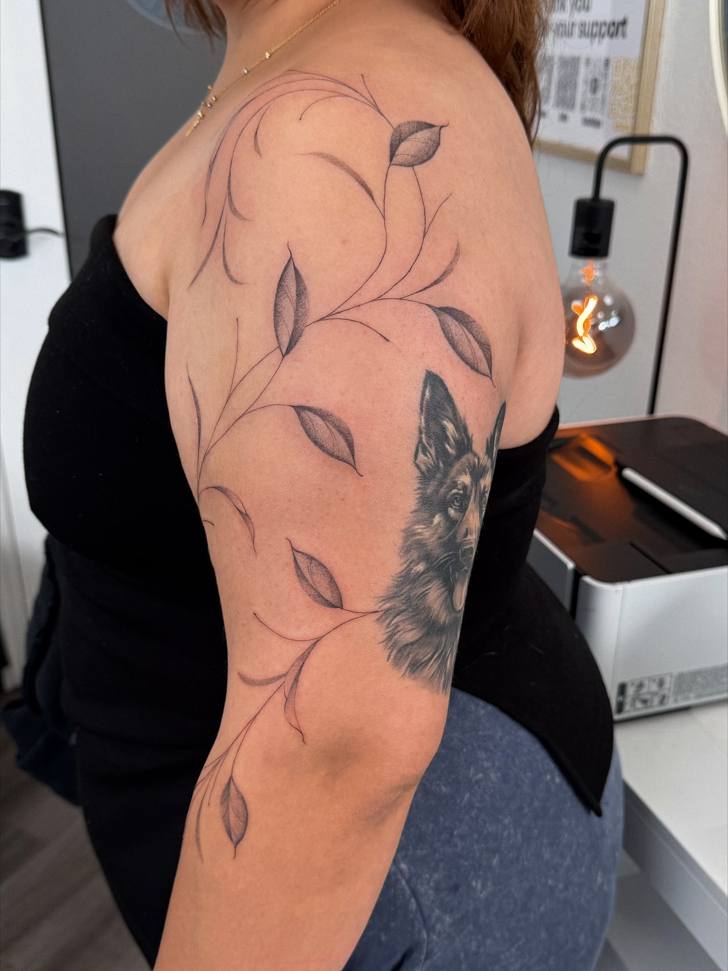 Wolf and leaves realism tattoo on the shoulder by Daniel Montoya, Charlotte, North Carolina