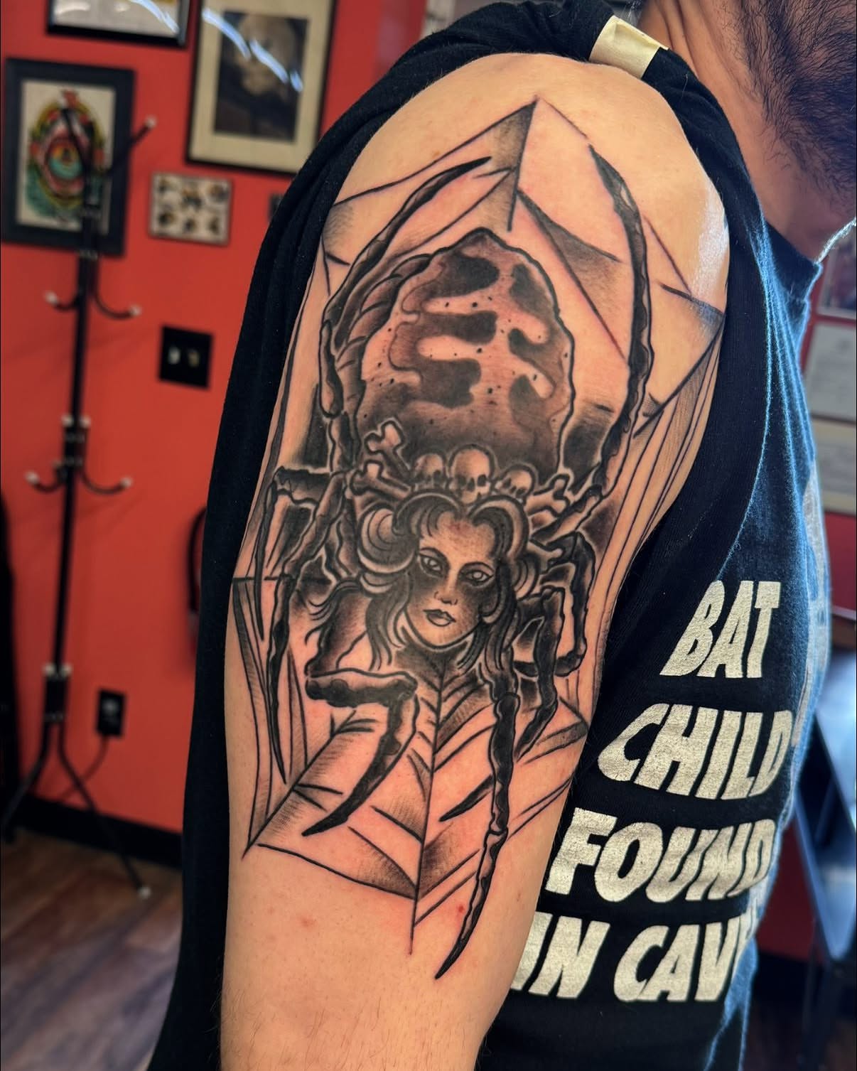 Woman with skull geometric tattoo on the shoulder by Josh Roberts, Franklin, Ohio