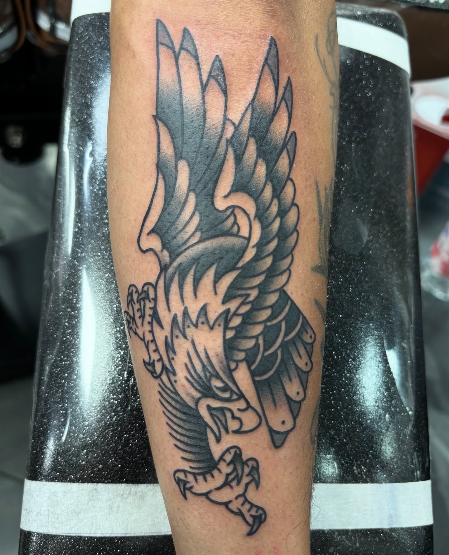Eagle American traditional tattoo on the forearm by @koma_tk