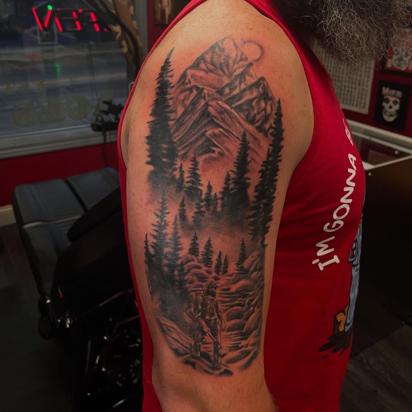 Mountain landscape realism tattoo on the upper arm by Chrissy Ungrew Tattoos, Covington, Kentucky