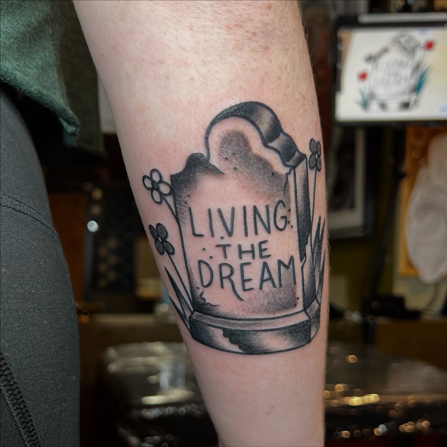Grave marker black and grey tattoo on the forearm by Cory Miller
