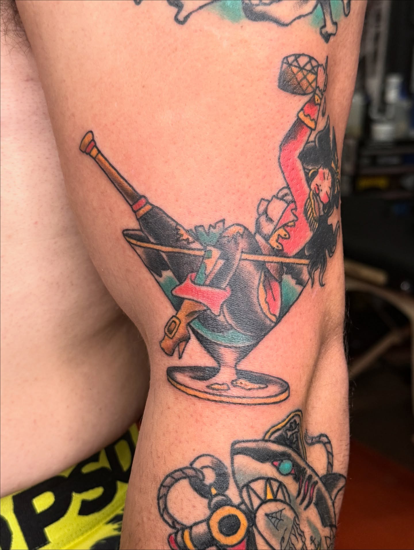 Martini glass with woman American traditional tattoo on the forearm by Andre Guerra