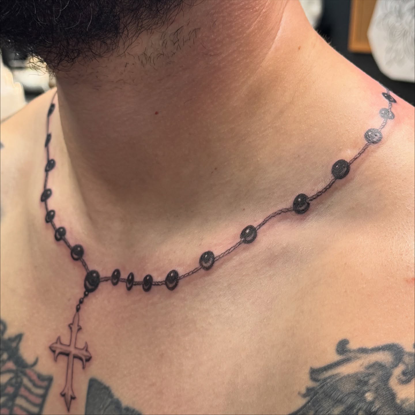 Rosary dotwork tattoo on the neck by Hori Shit