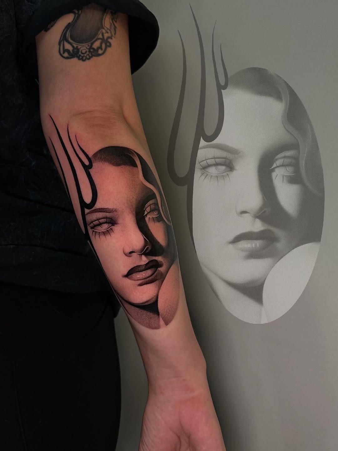 Portrait of a woman with flames surrealism tattoo on the forearm by @piinkywabbiit, Roselle Park, New Jersey