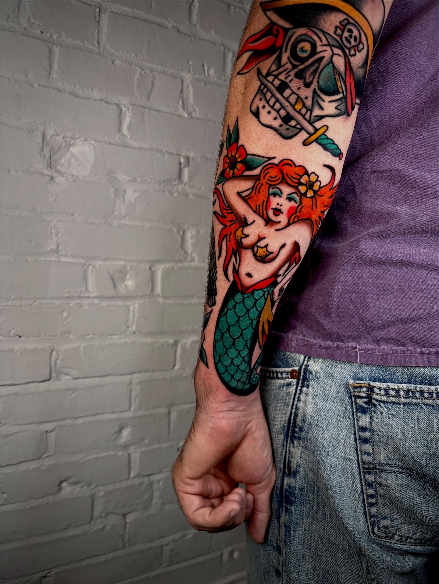 Mermaid American traditional tattoo on the forearm by Doug von