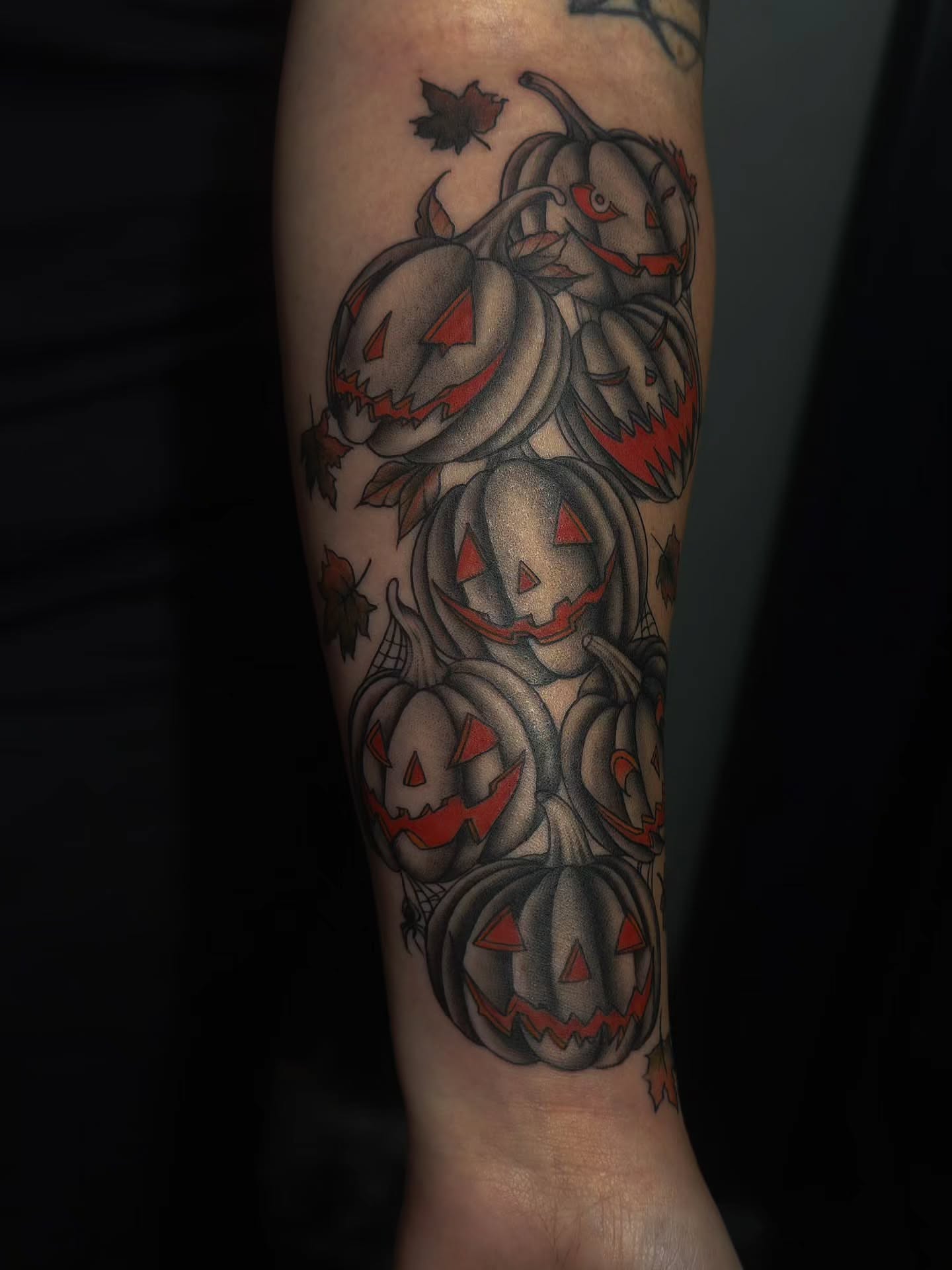 Pumpkins American traditional tattoo on the forearm by Trinity