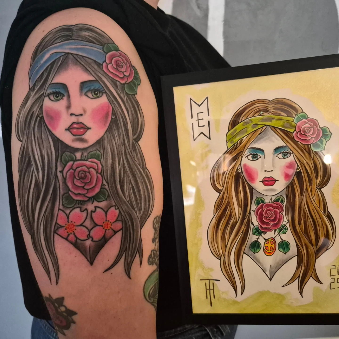 Woman with flowers American traditional tattoo on the upper arm by Matt Williamson