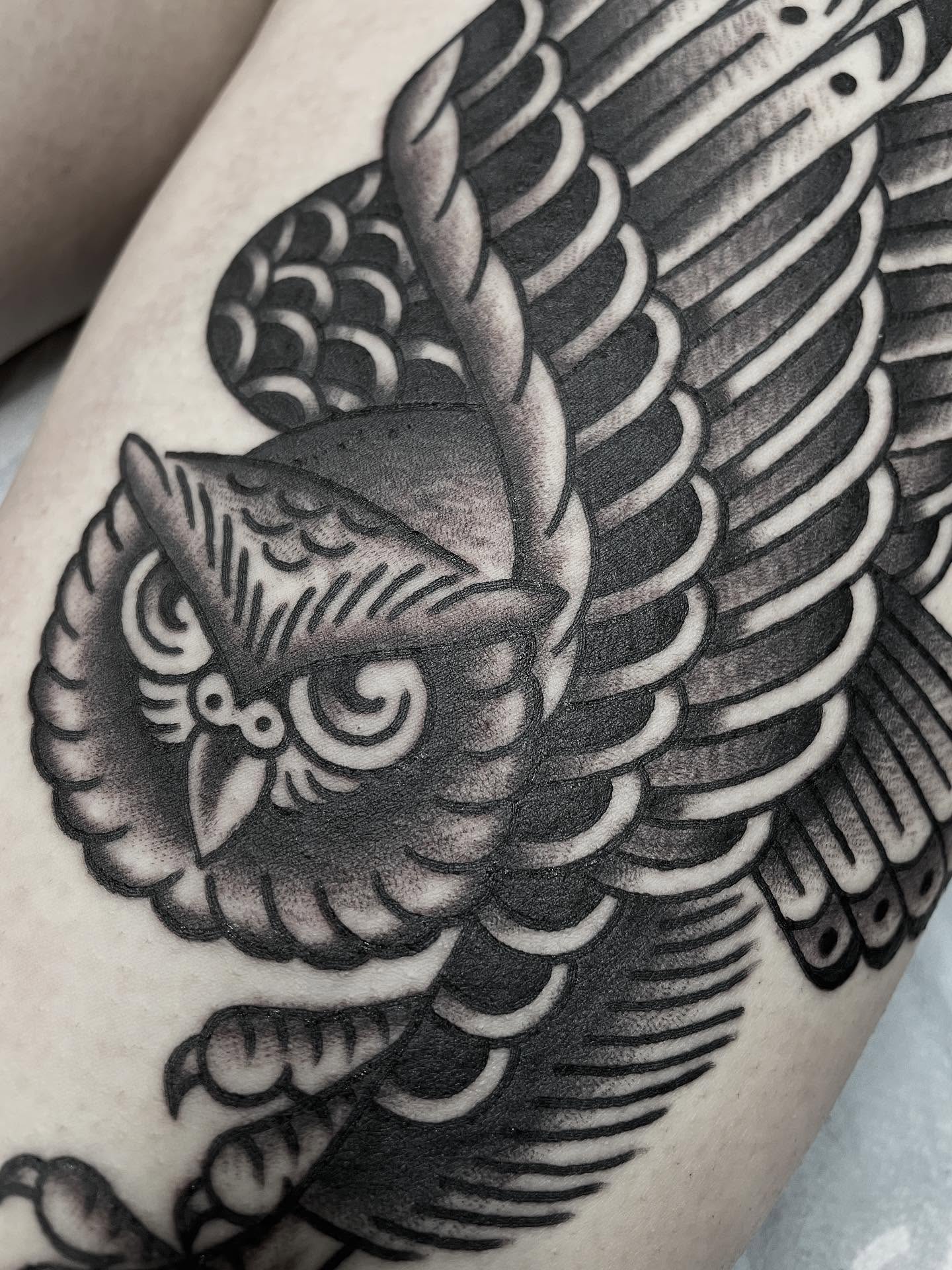 Owl black and grey tattoo on the thigh by Kat, Sacramento, California