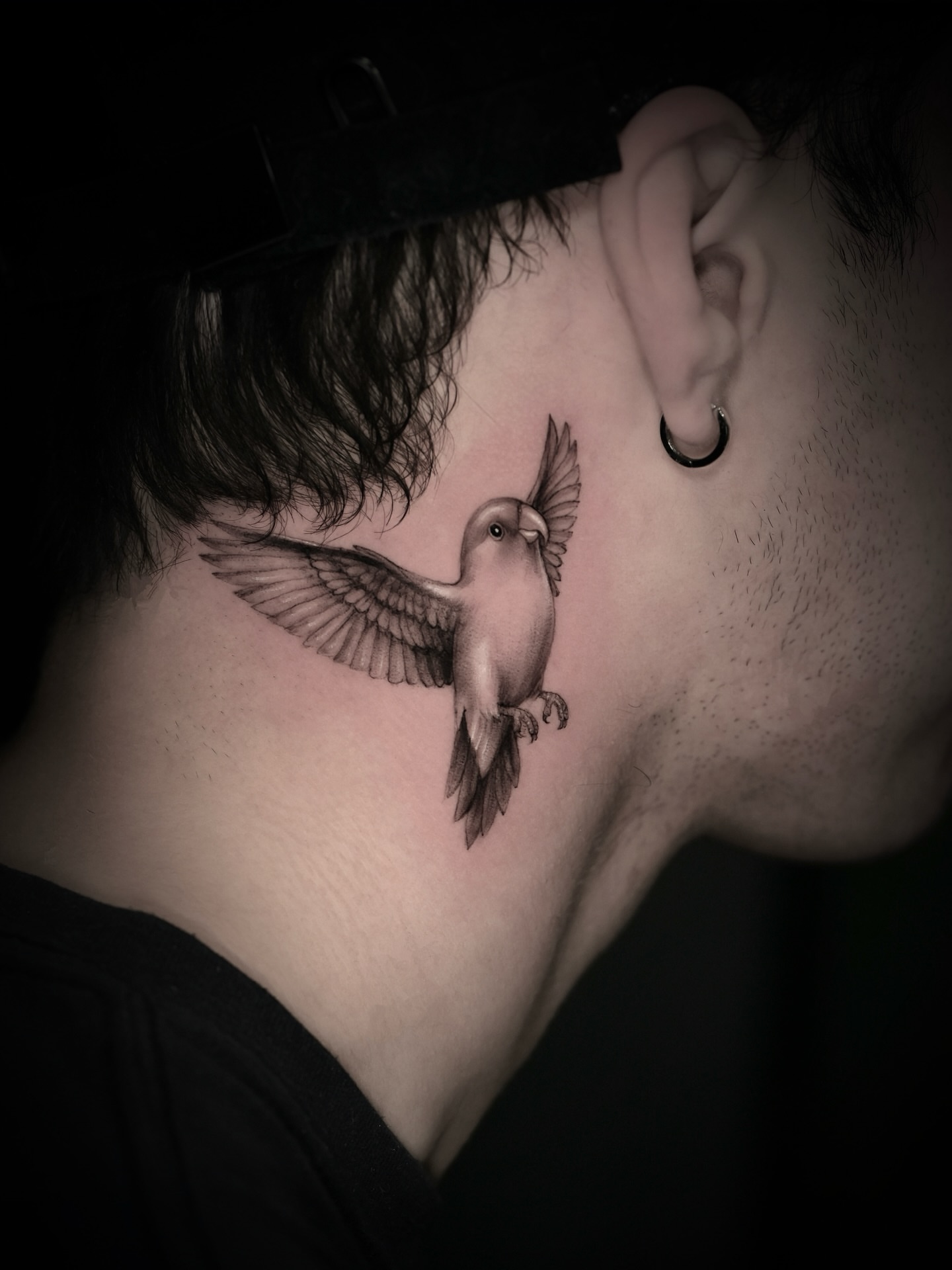 Bird realism tattoo on the neck by Zonghuan Wu