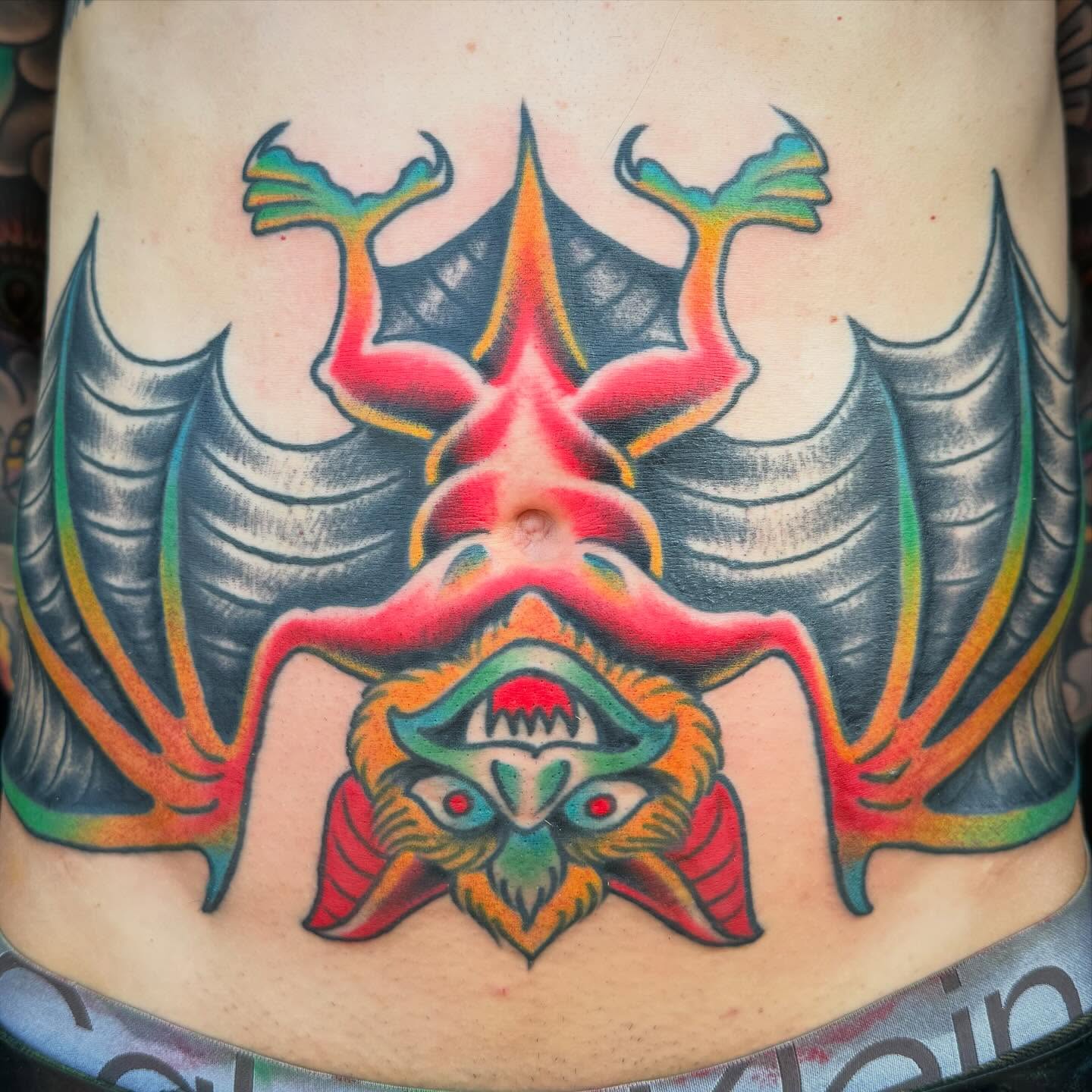 Bat American traditional tattoo on the torso by Zach Roman, Madison, Wisconsin