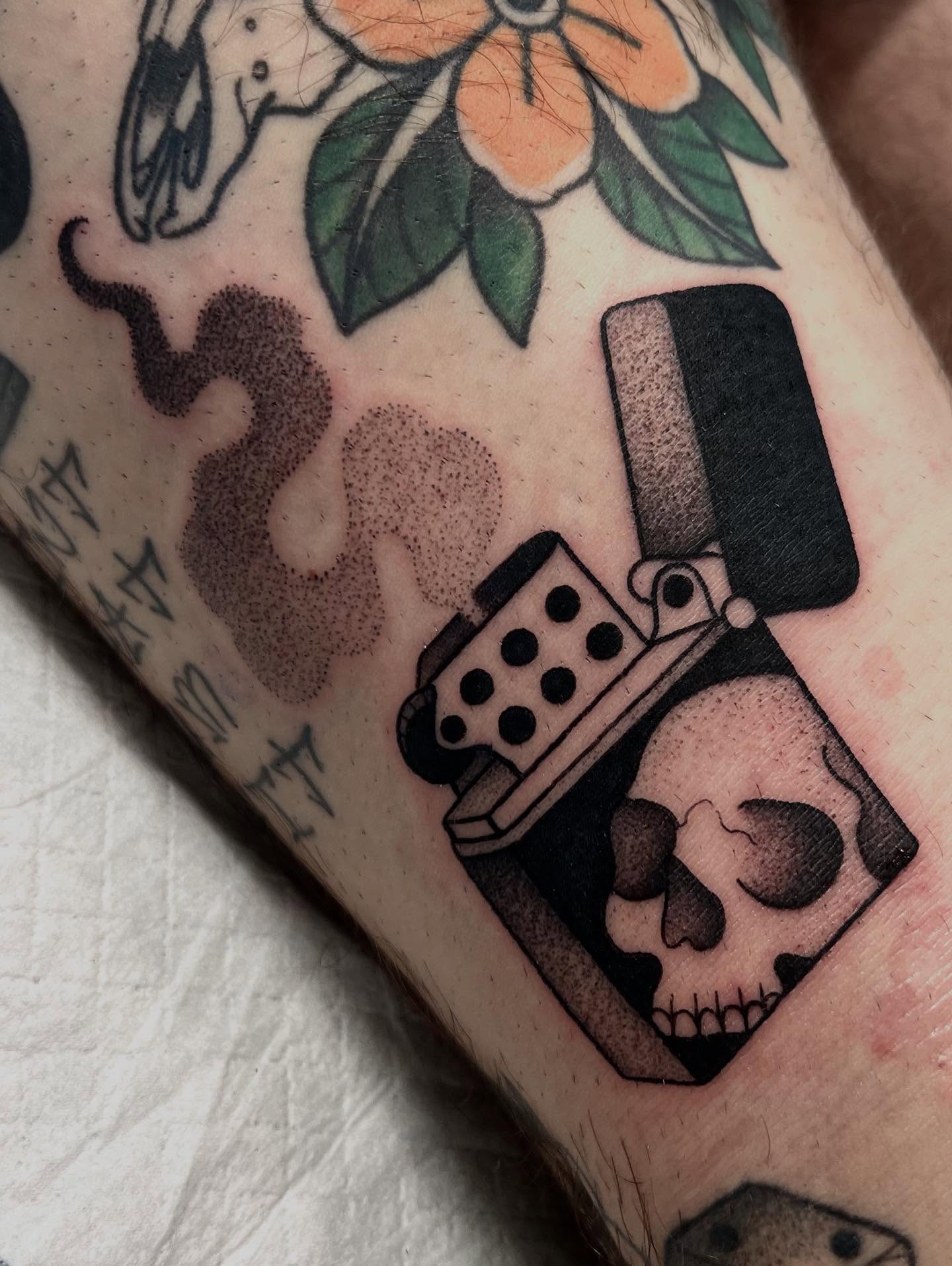 Lighter and skull black and grey tattoo on the forearm by 𝖆𝖑𝖞𝖘𝖘𝖆 ☽
