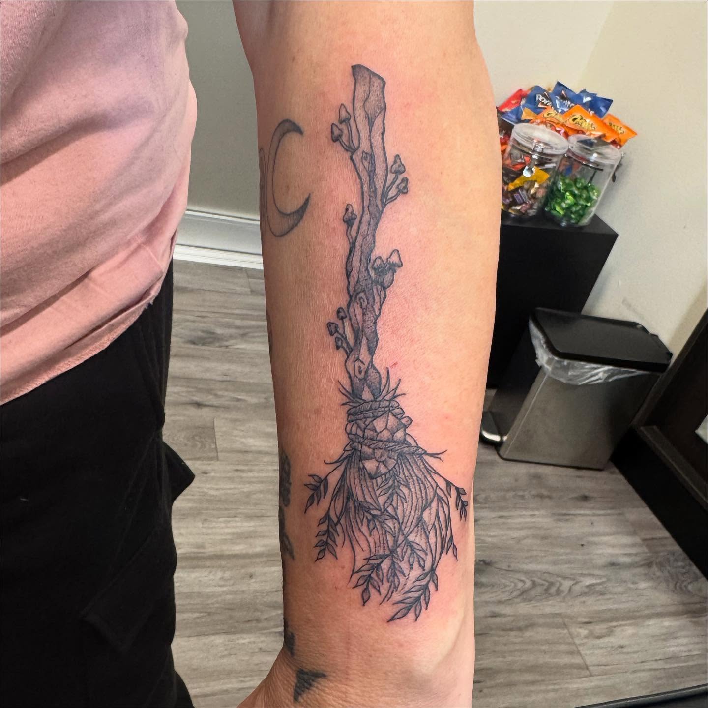 Root system black and grey tattoo on the forearm by Gladys L.