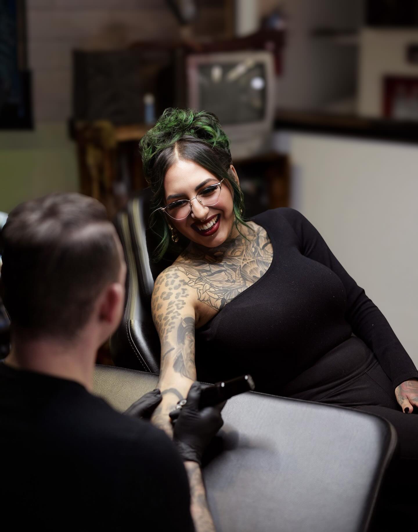 Tattooed arm black and grey tattoo on the upper arm by Dave James