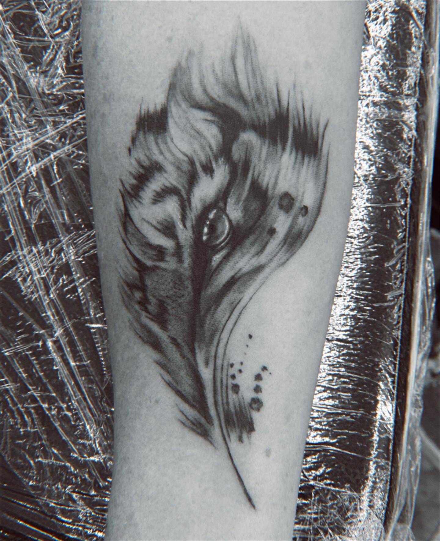 Bird realism tattoo on the forearm by Lissy Red