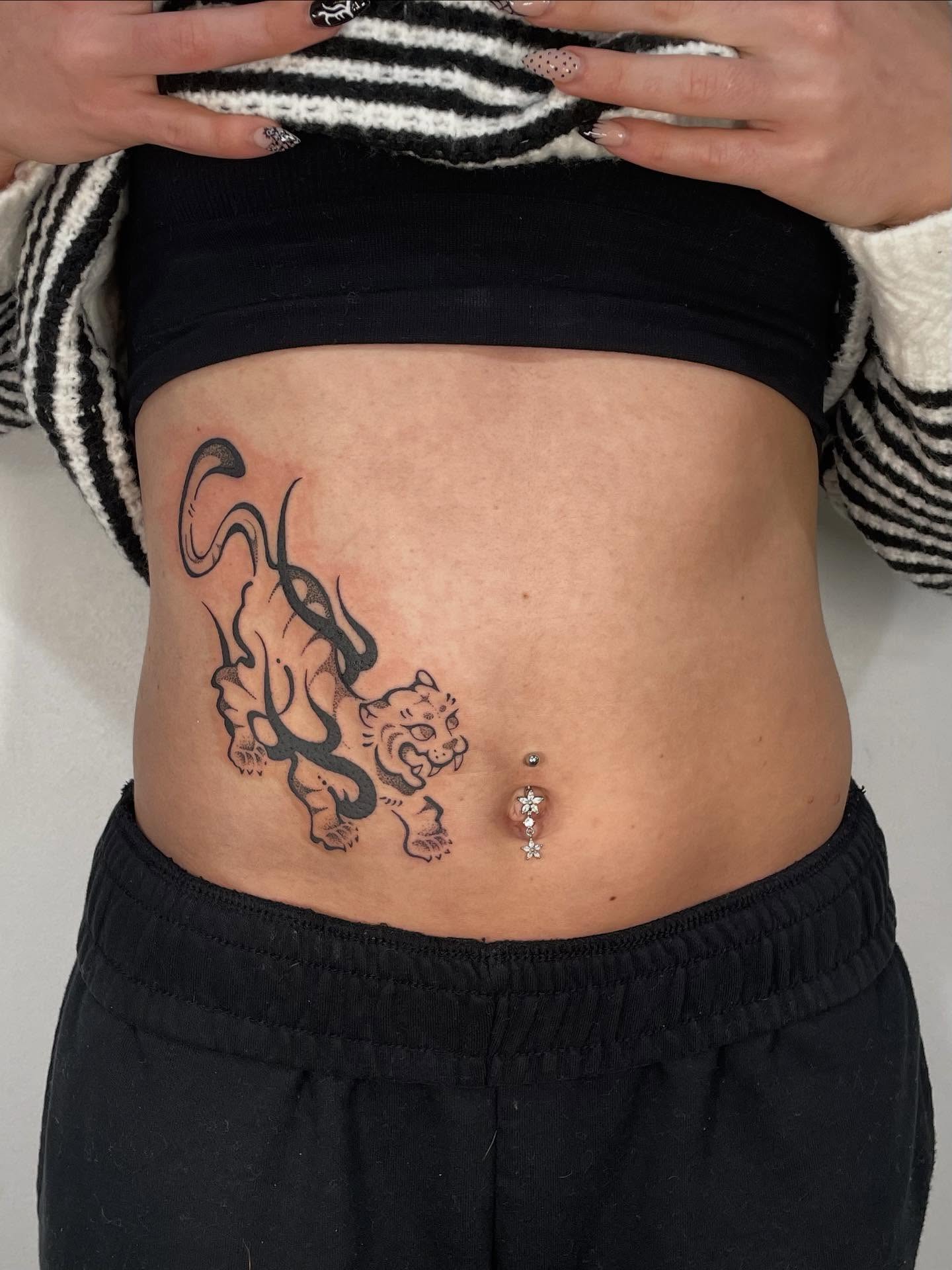 Tiger black and grey tattoo on the torso by sarah ✶