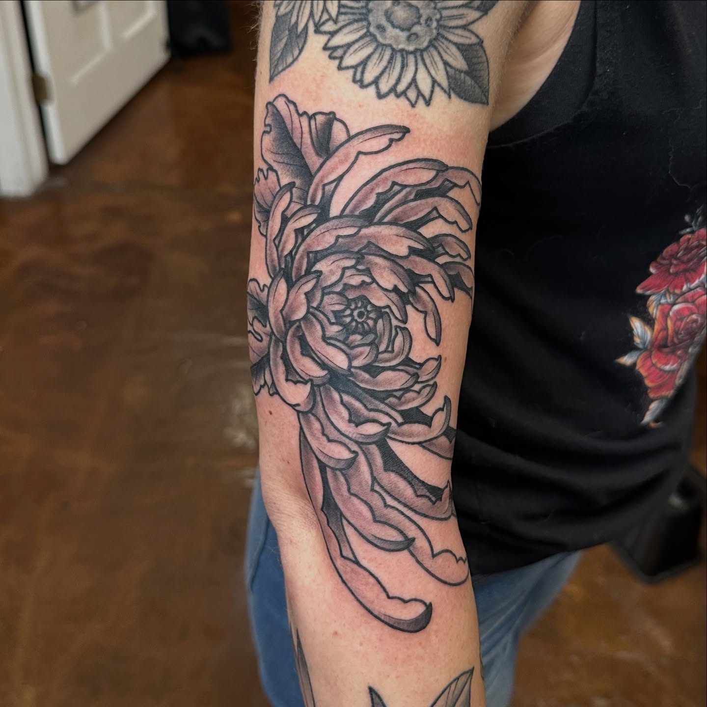 Peony American traditional tattoo on the forearm by Nick Bones, Las Vegas, Nevada