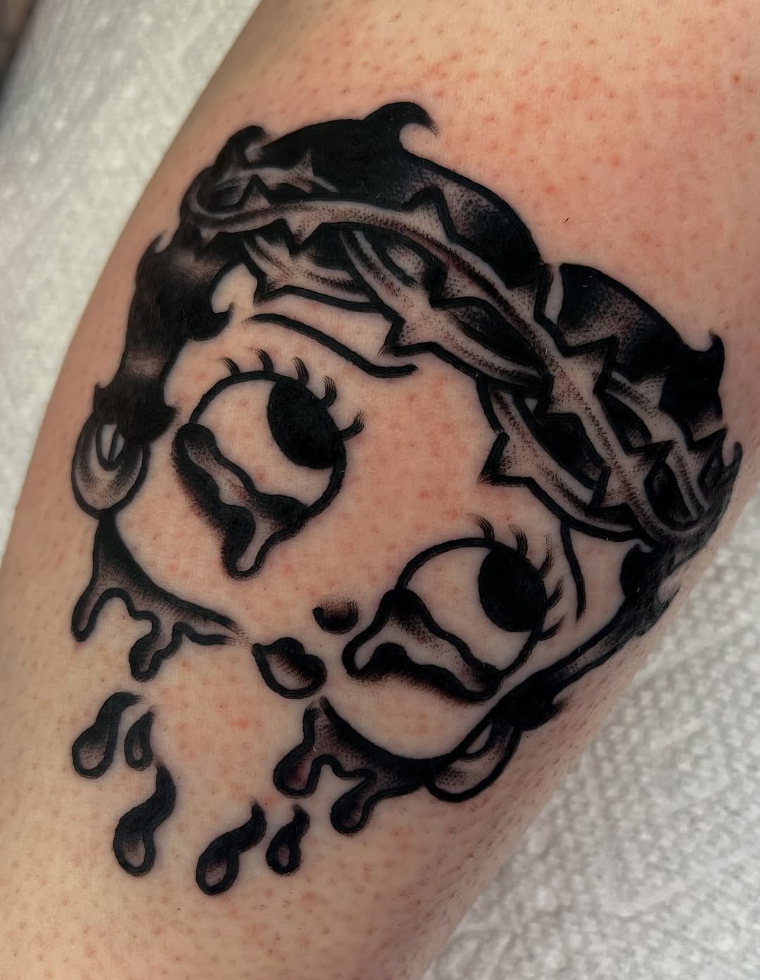 Betty boop with crown of thorns realism tattoo on the forearm by ✨ Gabi ✨