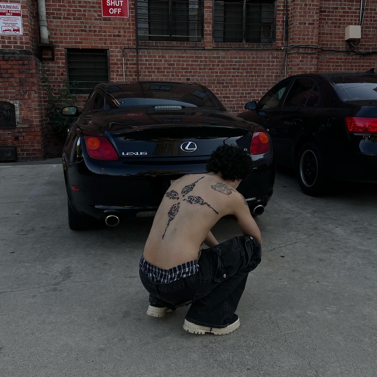 Tribal tribal tattoo on the back by Ladyjutsu