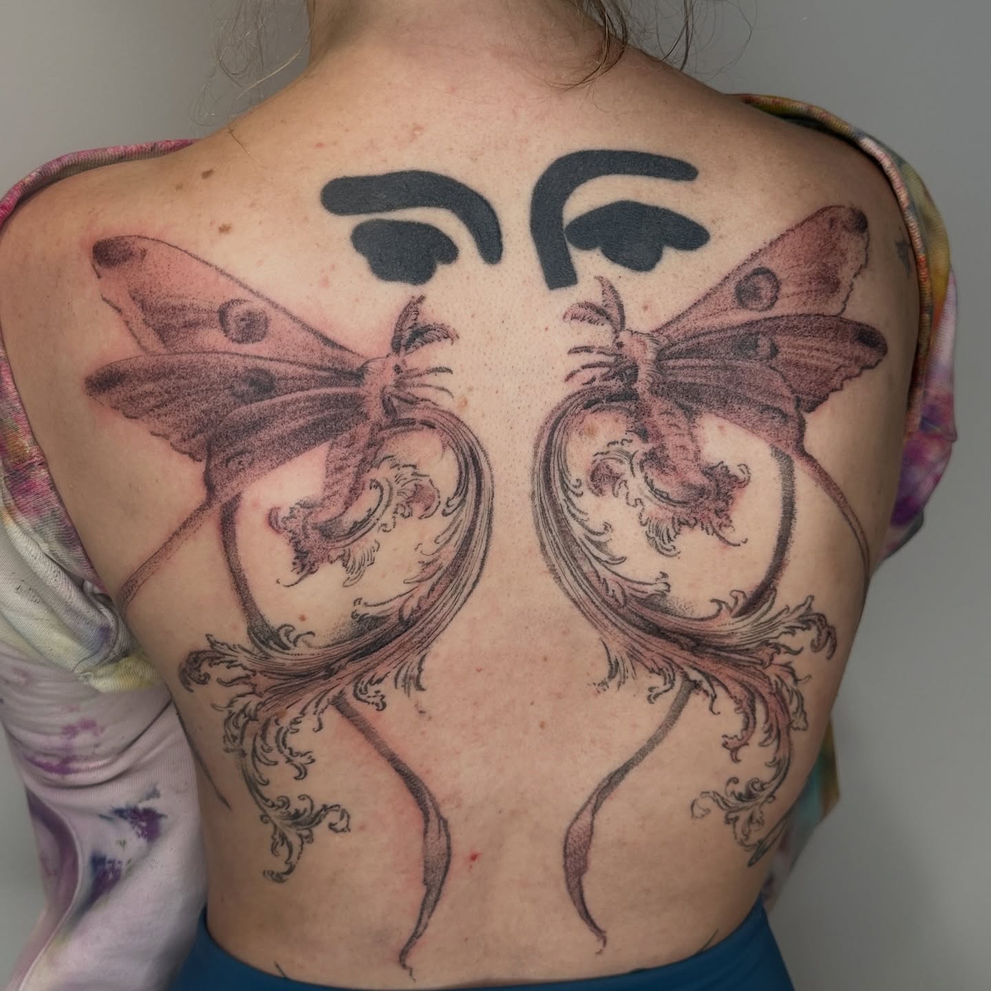 Moths dotwork tattoo on the back by πΈππππππ