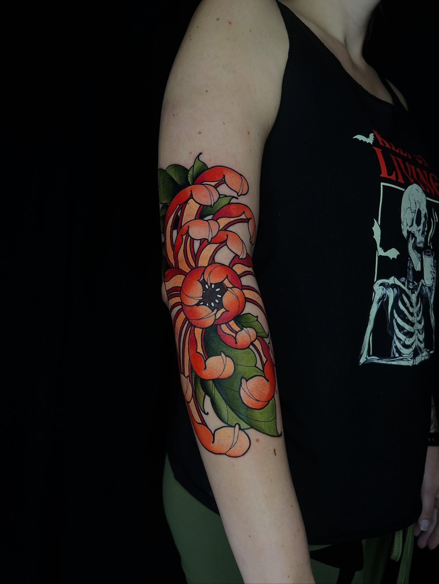 Floral arrangement American traditional tattoo on the forearm by Pam Sanders
