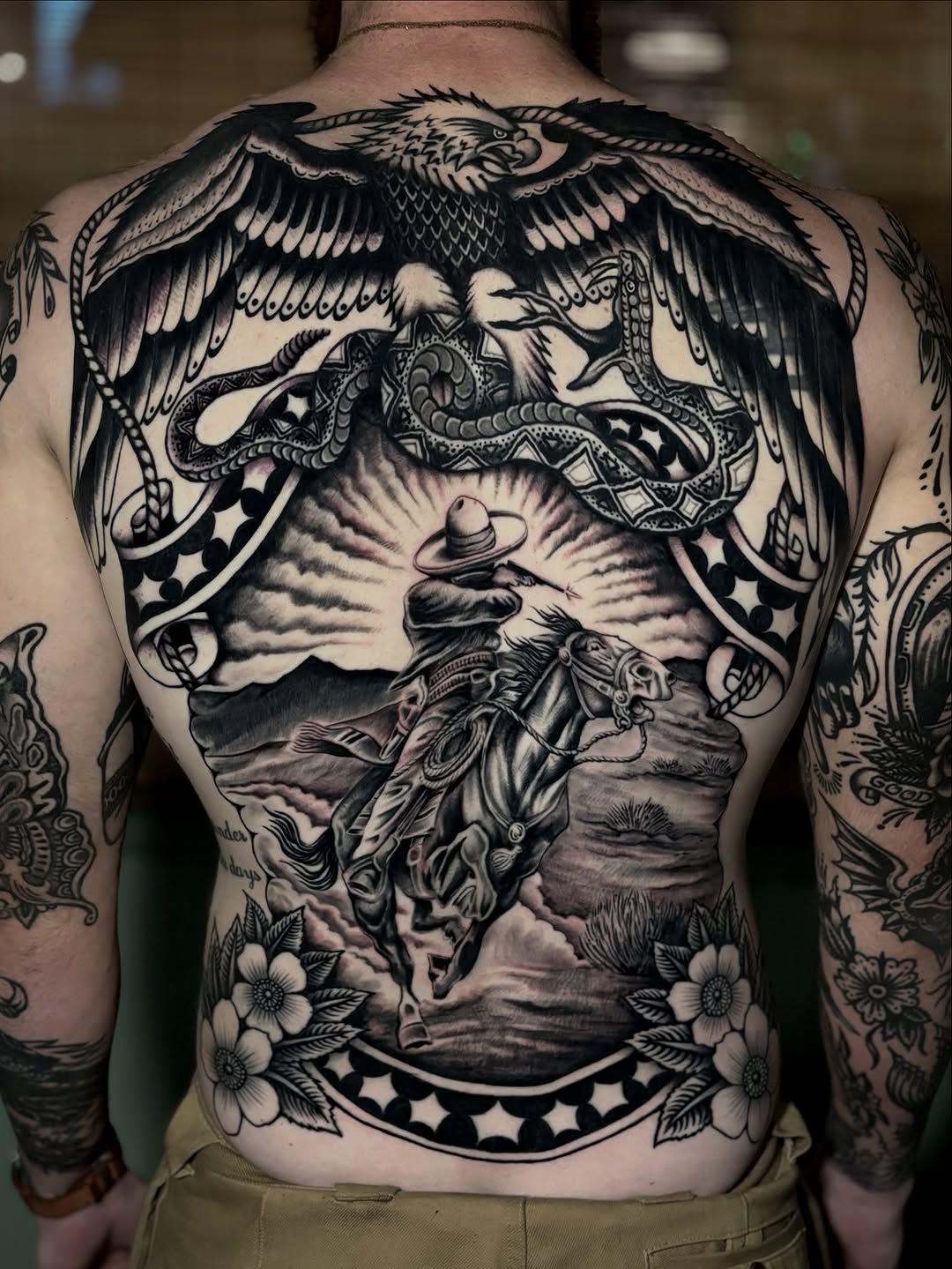Chicano tattoo on the back by Weston Imhoff
