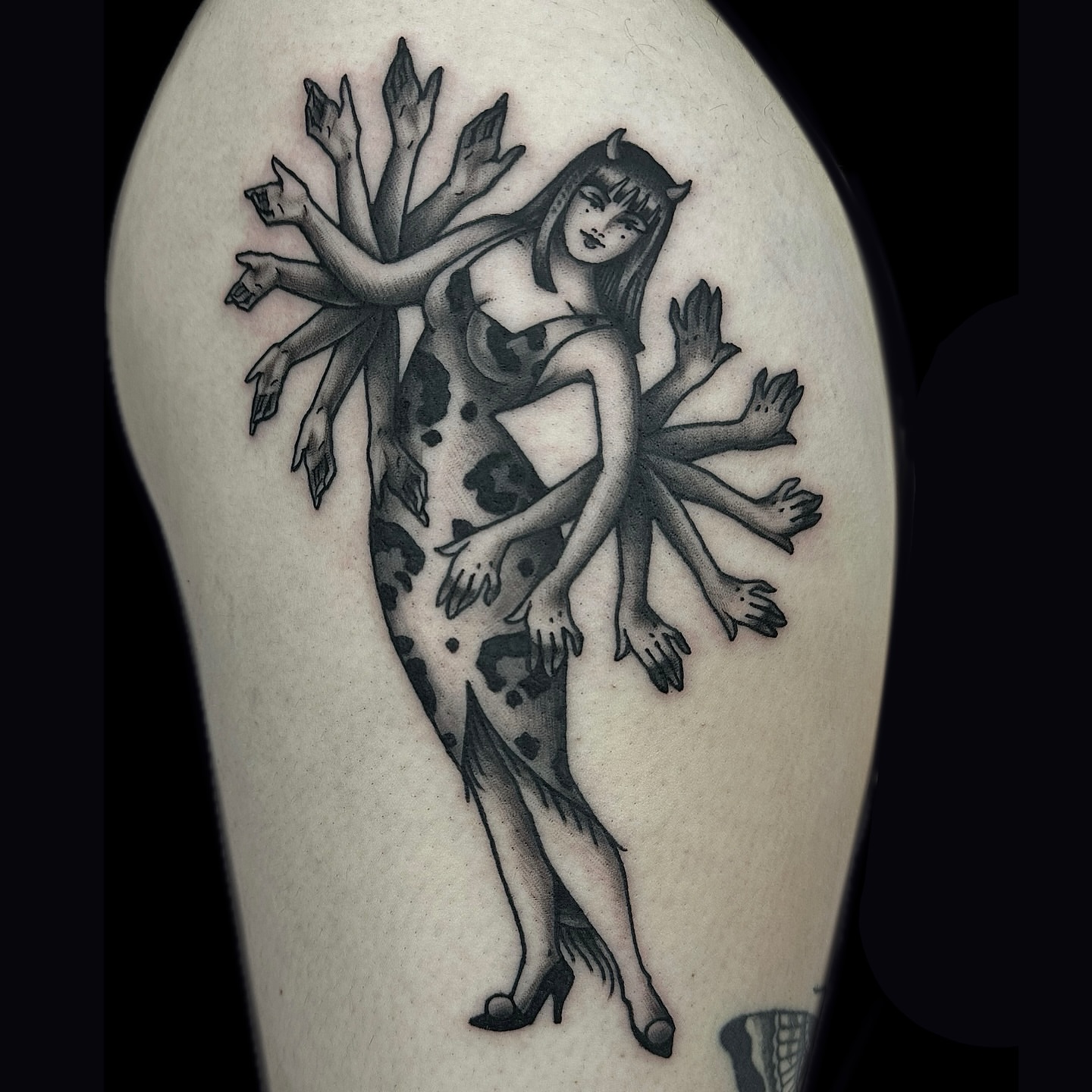 Woman with tree-like arms realism tattoo on the upper arm by Madeline Brown