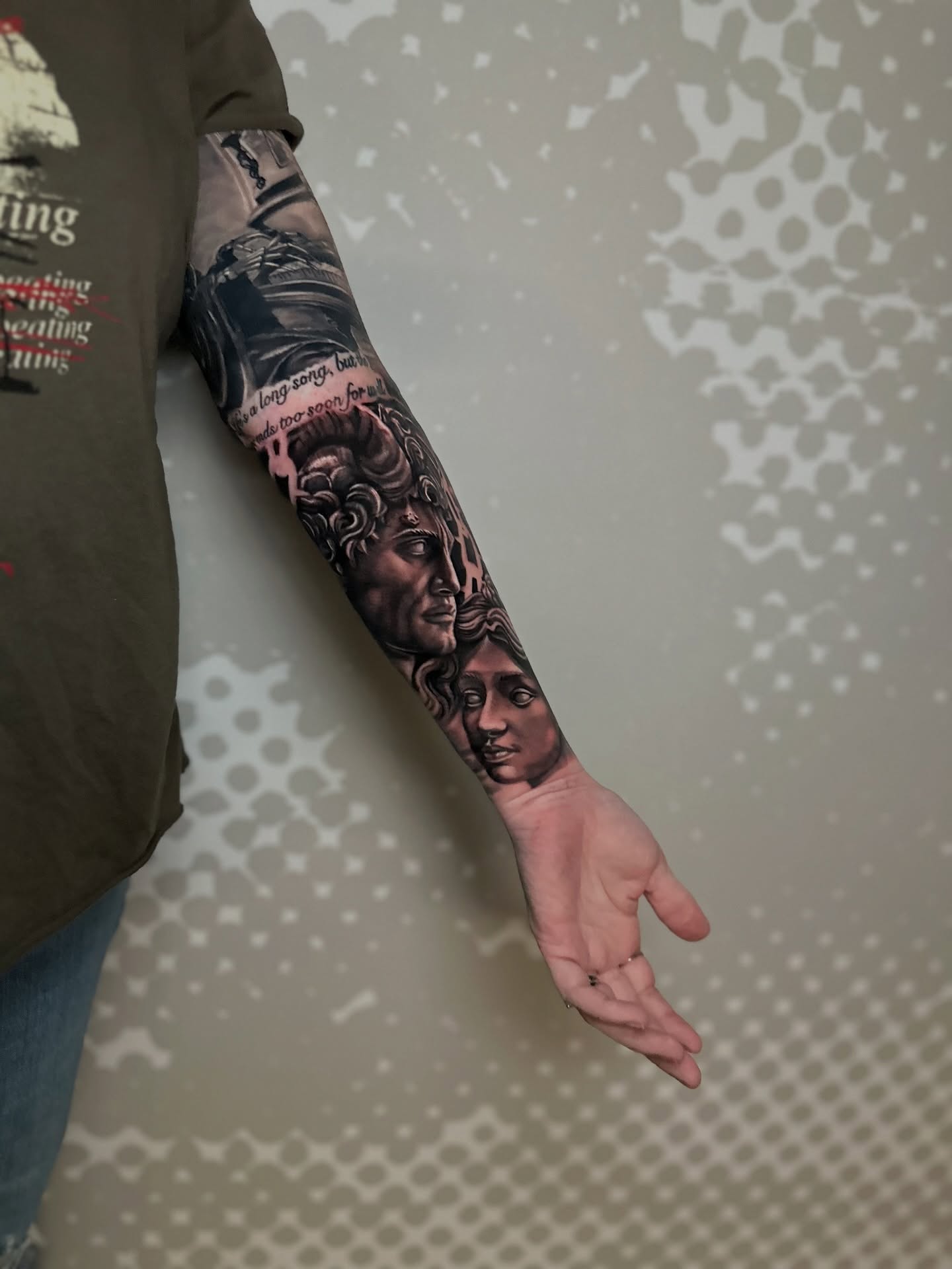 Faces realism tattoo on the forearm by Charlotte Tattoo Artist
