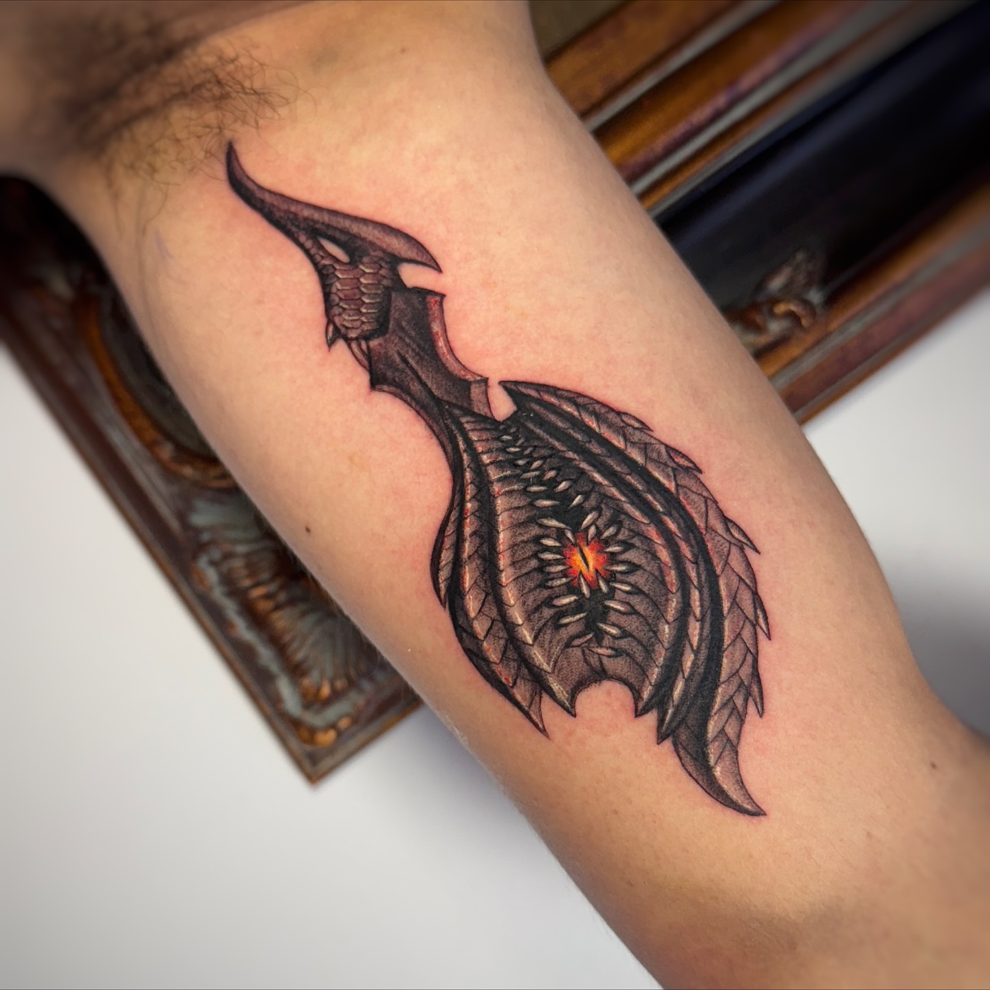 Dragon black and grey tattoo on the forearm by Jemin Ren
