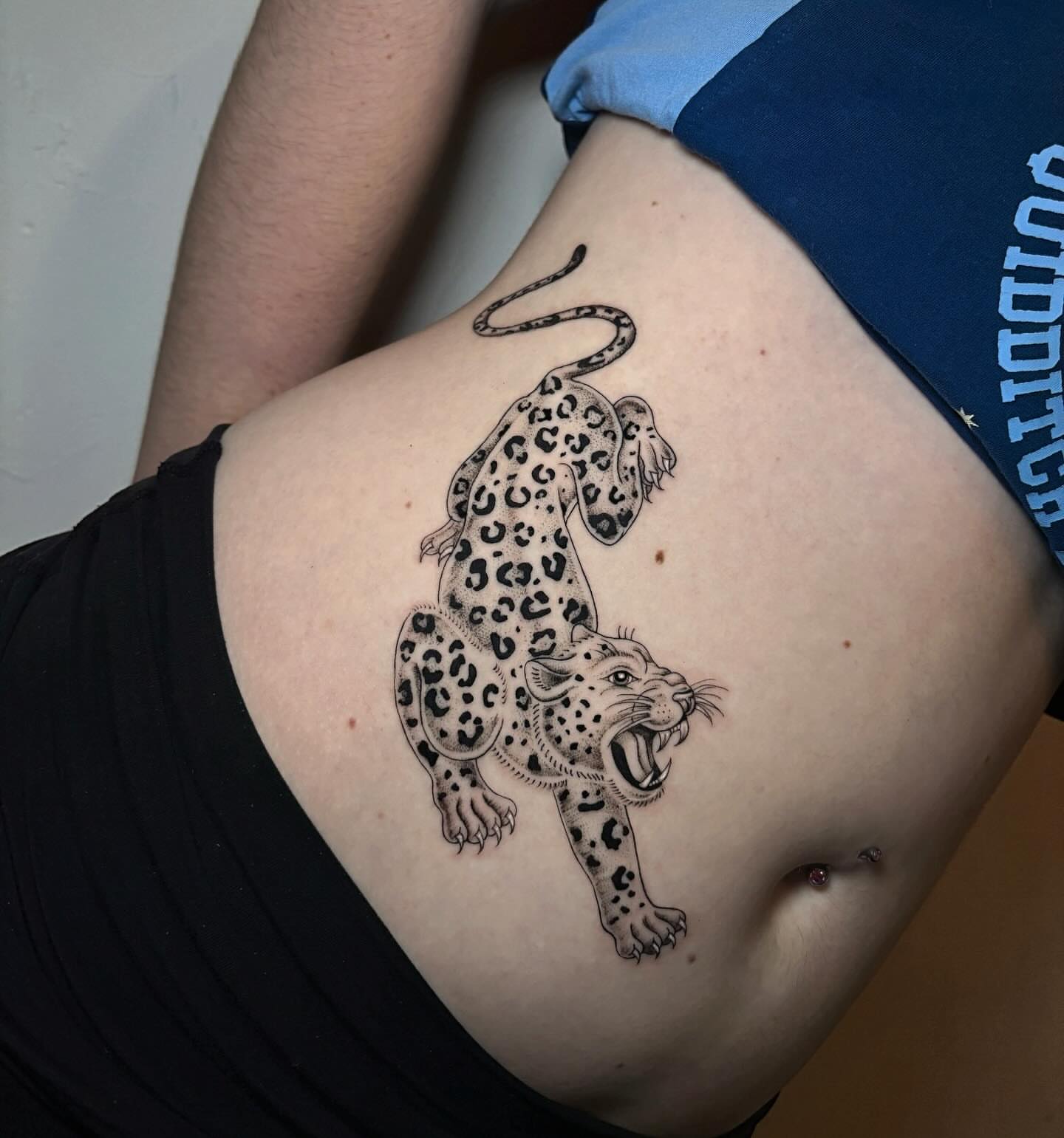Leopard black and grey tattoo on the ribs by l i z ✶