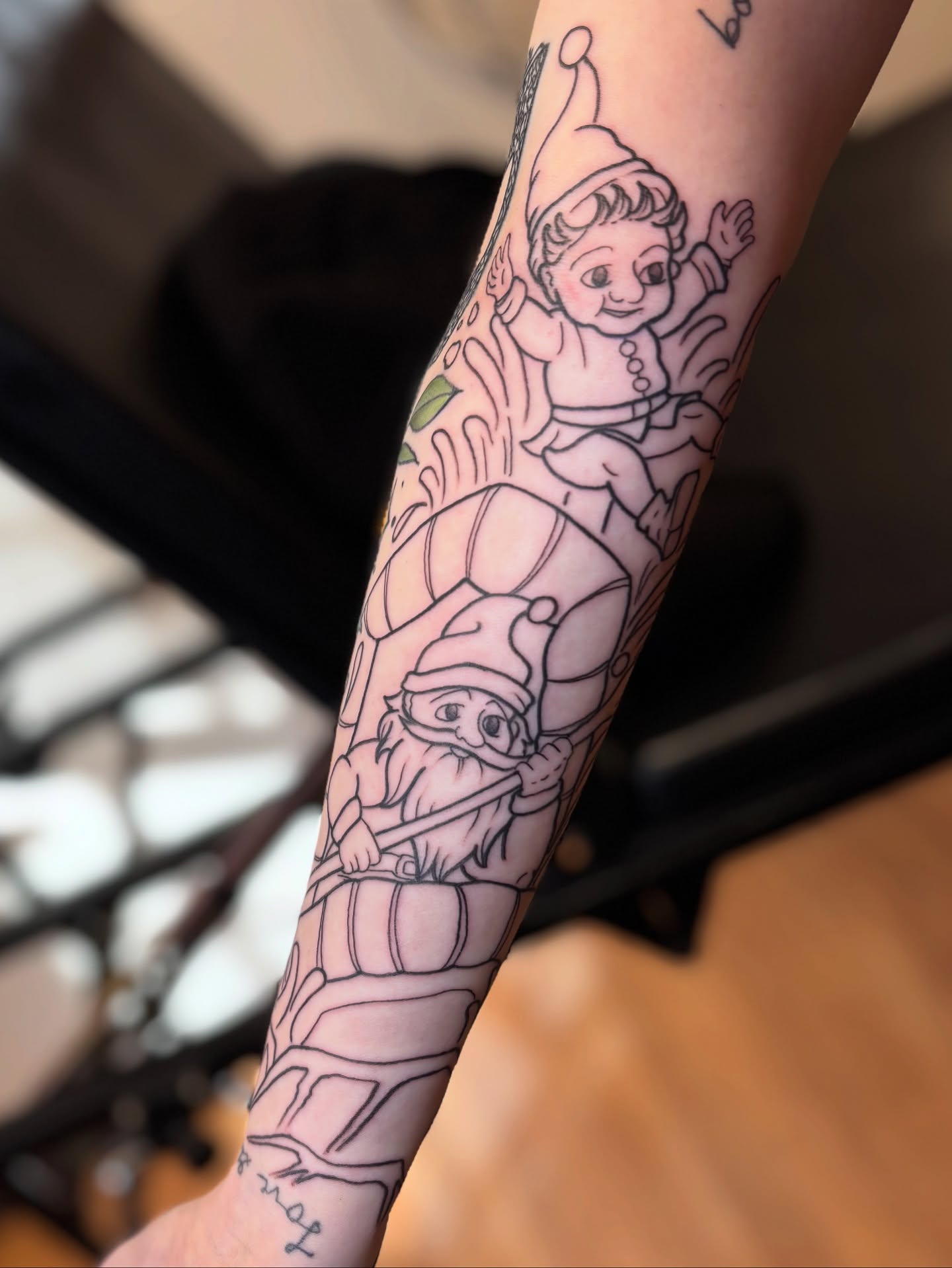 Elfs and barrel black and grey tattoo on the forearm by Dee - MA Tattoo Artist, Concord, Massachusetts