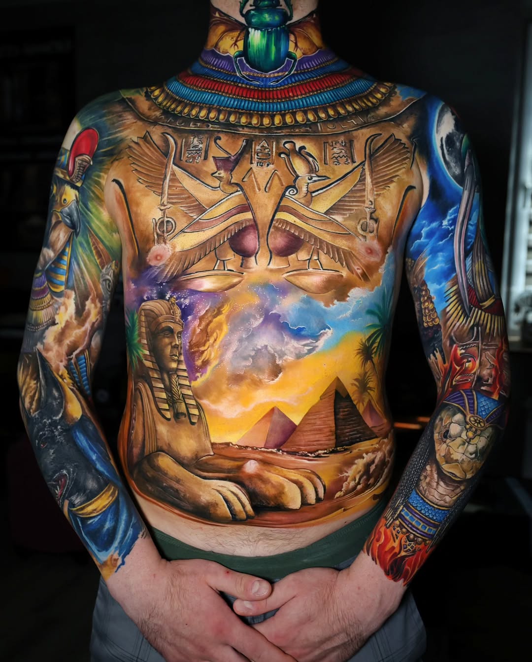 Egyptian mythology landscape neo-traditional tattoo on the torso by Marek Pawlik