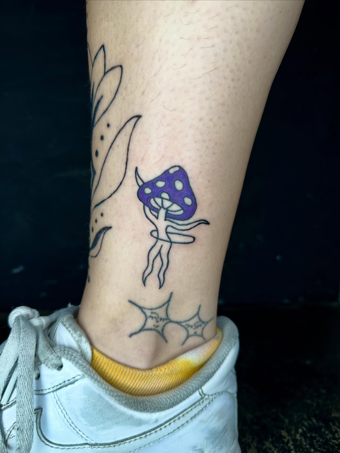 Mushroom fairy dotwork tattoo on the forearm by Jadelin, San Francisco, California