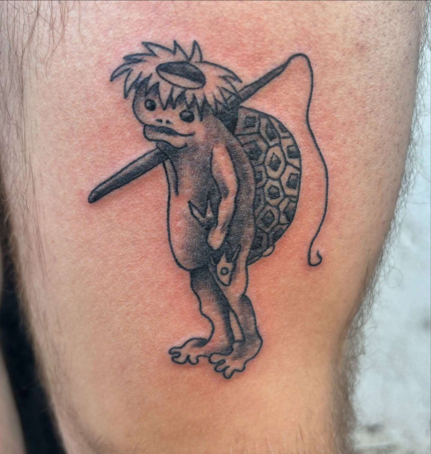 Turtle boy black and grey tattoo on the thigh by Francis Cassidy
