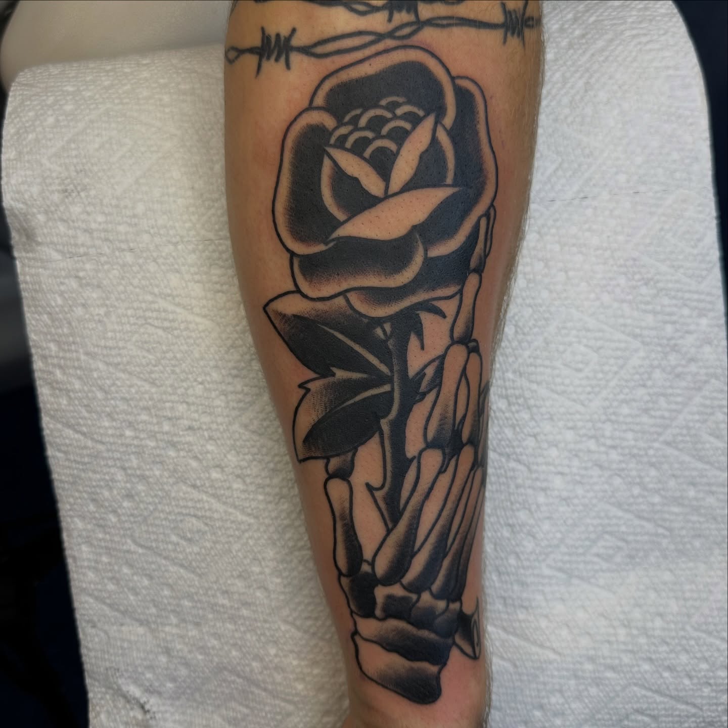 Rose and skeleton hands realism tattoo on the forearm by 🦷J.McHugh🦷