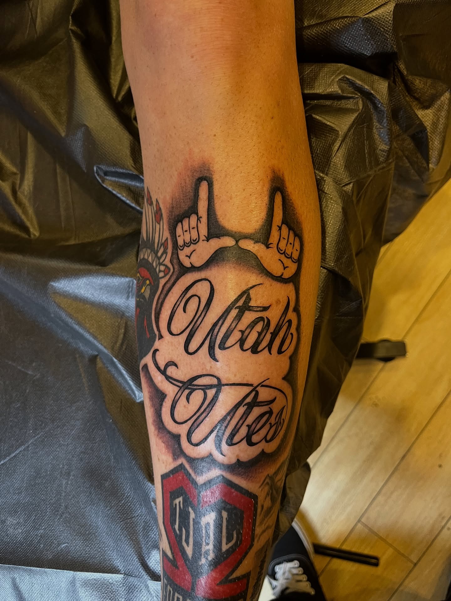 Utah Utes lettering script tattoo on the forearm by Winston Thai